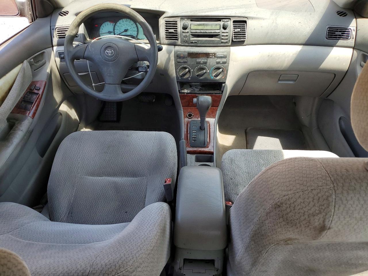 2003 Toyota Corolla Le Красный vin: JTDBR32E930046813