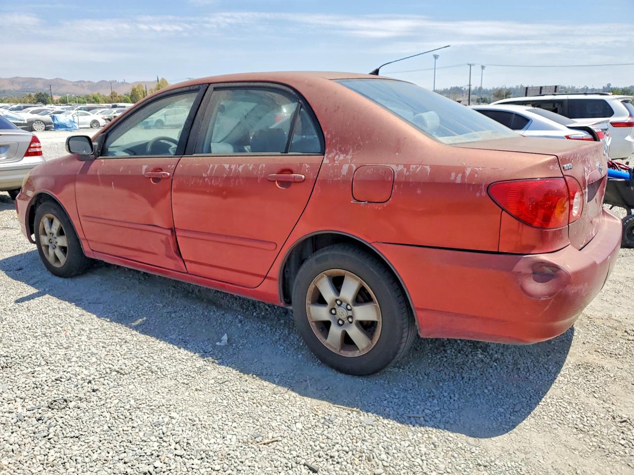 2003 Toyota Corolla Le Красный vin: JTDBR32E930046813