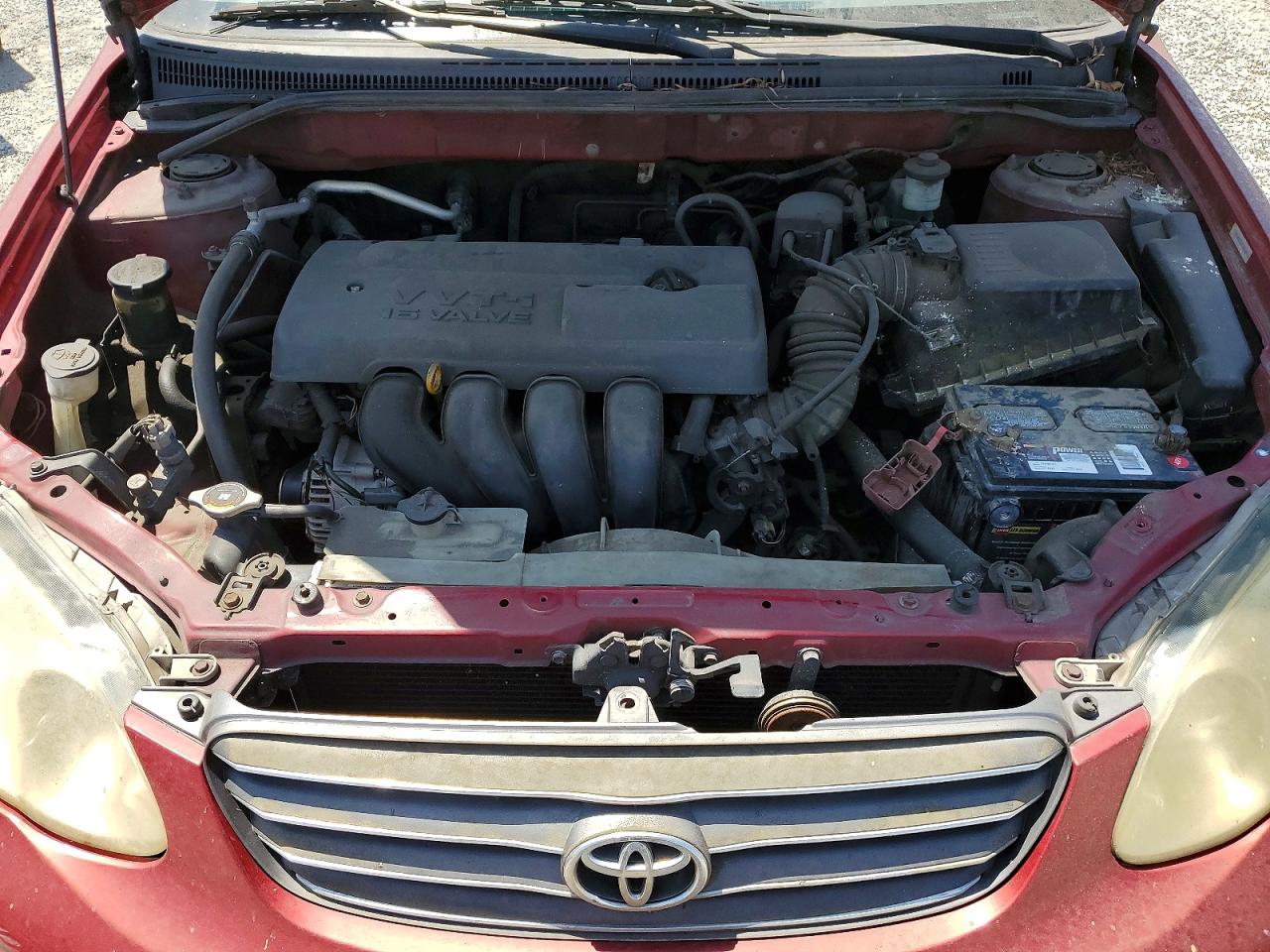 2003 Toyota Corolla Le Красный vin: JTDBR32E930046813
