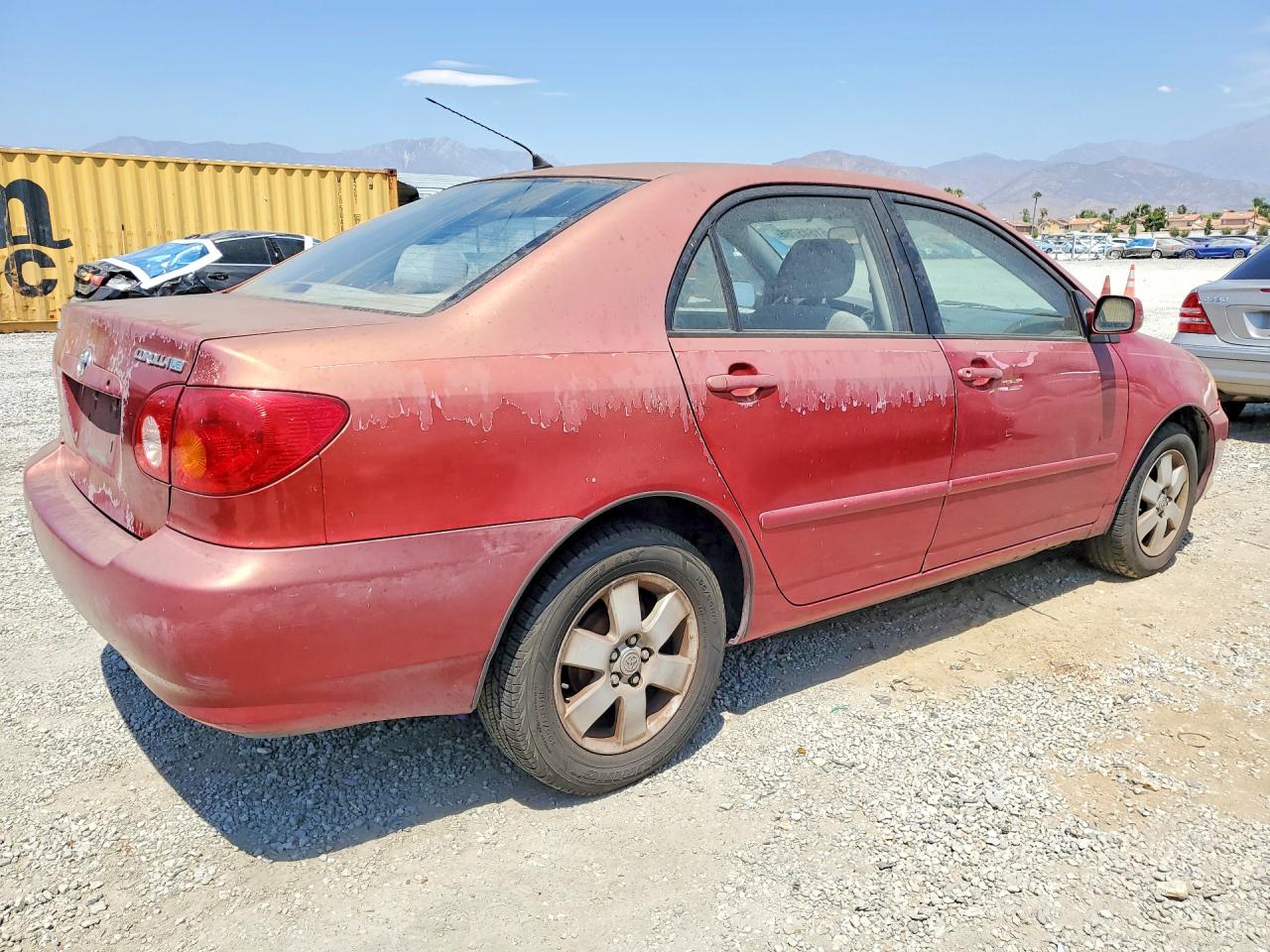 2003 Toyota Corolla Le Красный vin: JTDBR32E930046813