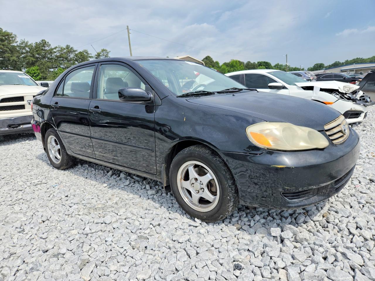 2003 Toyota Corolla Le Черный vin: JTDBR32E930049937