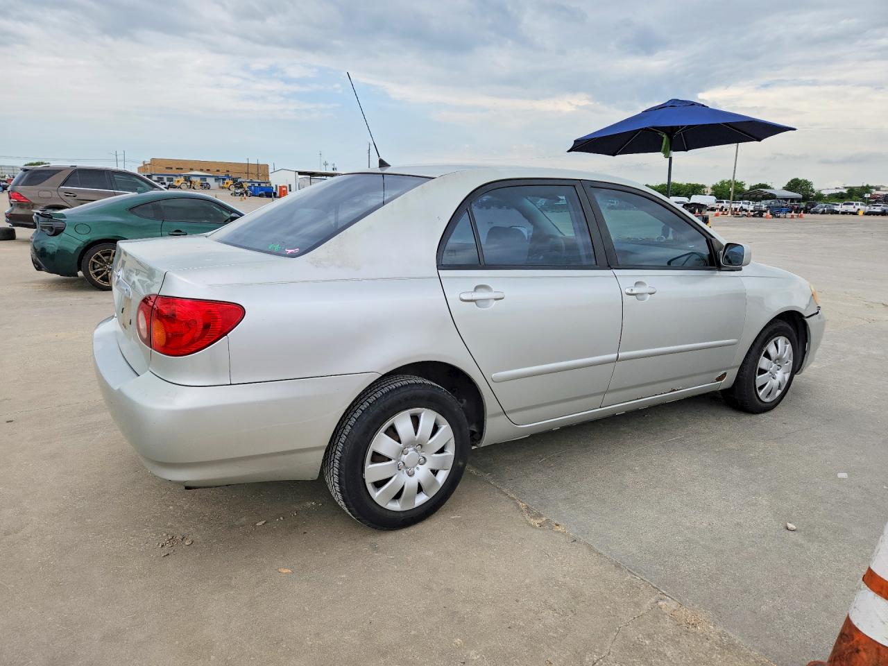 2003 Toyota Corolla Le Серебряный vin: JTDBR32E932009877