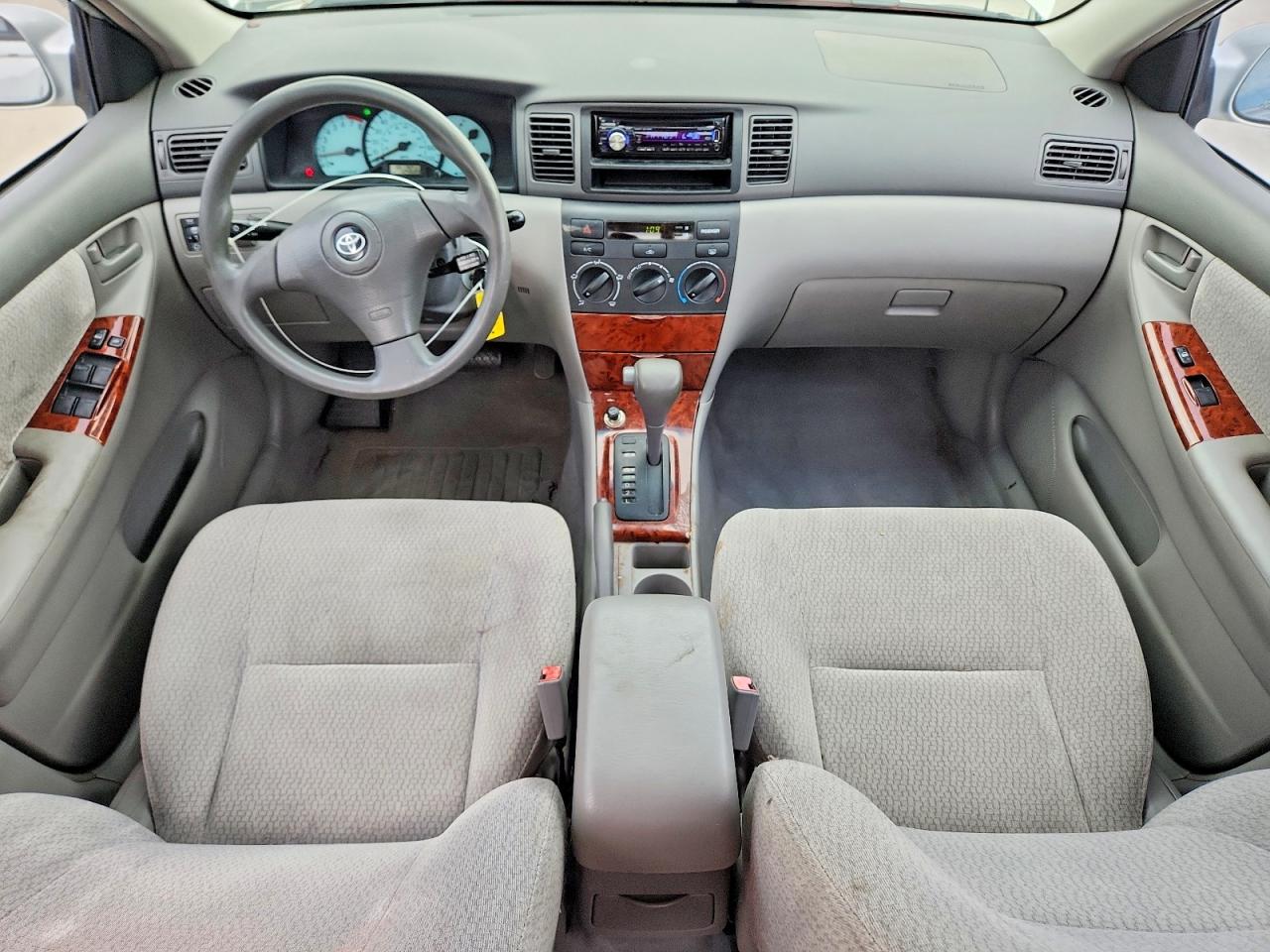 2003 Toyota Corolla Le Серебряный vin: JTDBR32E932009877
