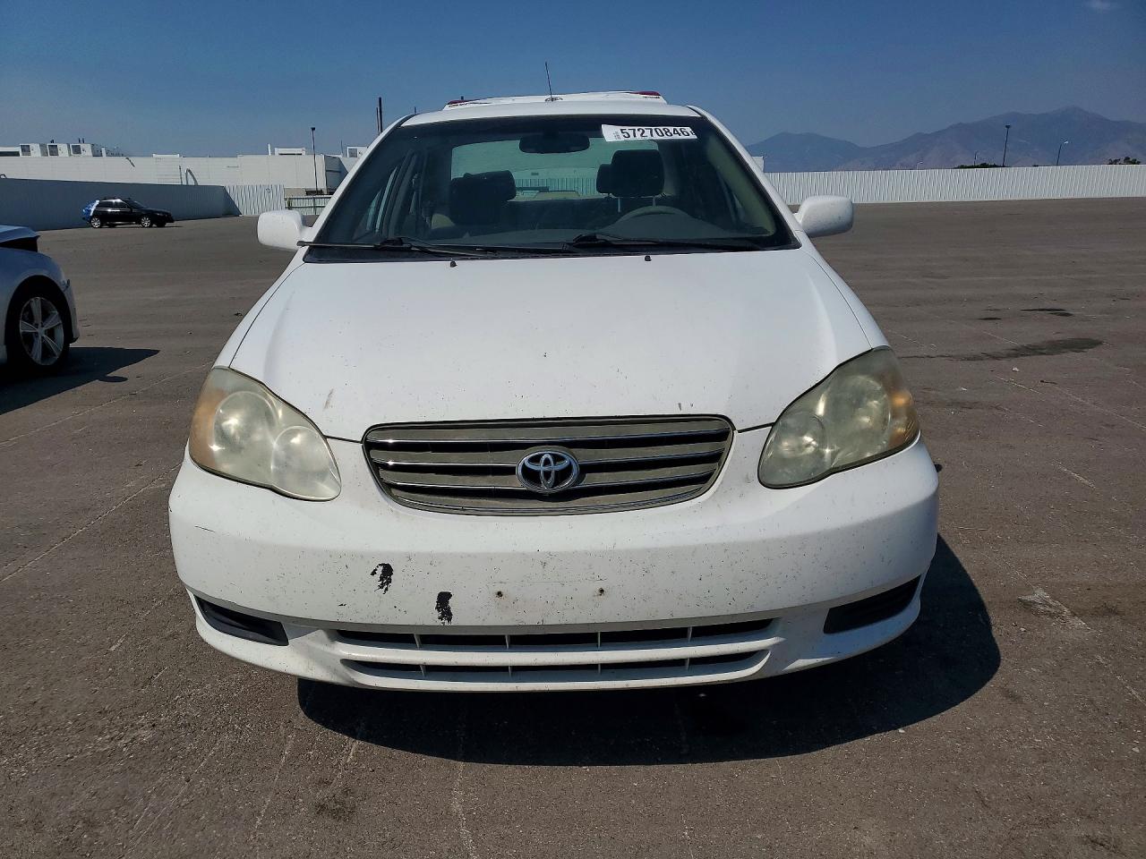 2004 Toyota Corolla Le White vin: JTDBR32E942018578