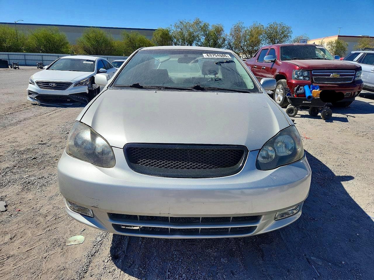 2003 Toyota Corolla Ce Tan vin: JTDBR32EX30024433