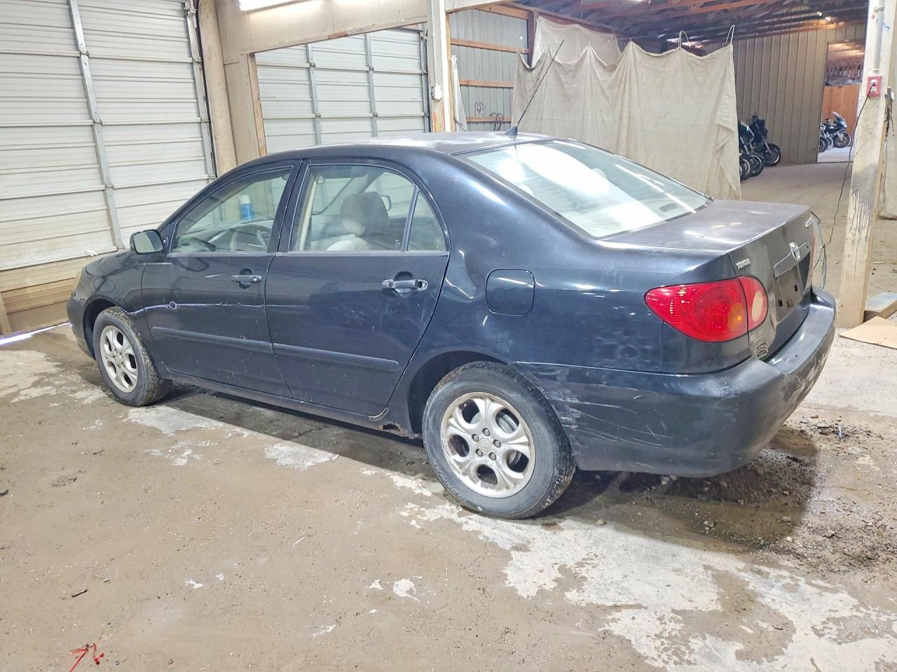 2003 Toyota Corolla Le Black vin: JTDBR32EX30030605