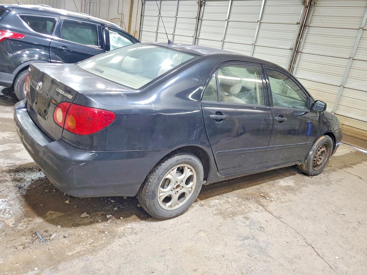 2003 Toyota Corolla Le Black vin: JTDBR32EX30030605