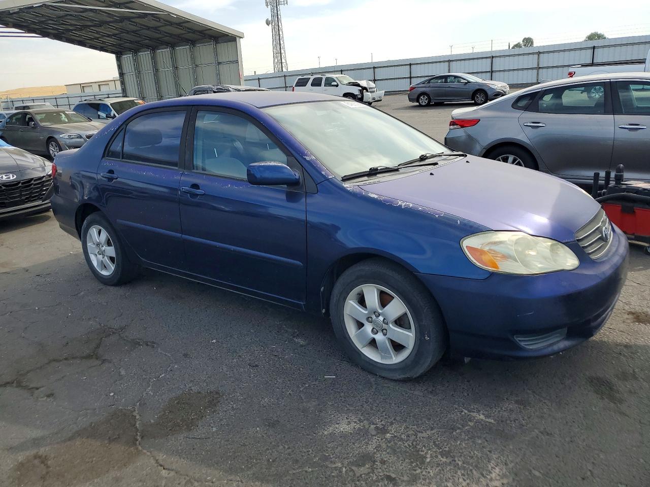 2003 Toyota Corolla Le Blue vin: JTDBR38E730041987