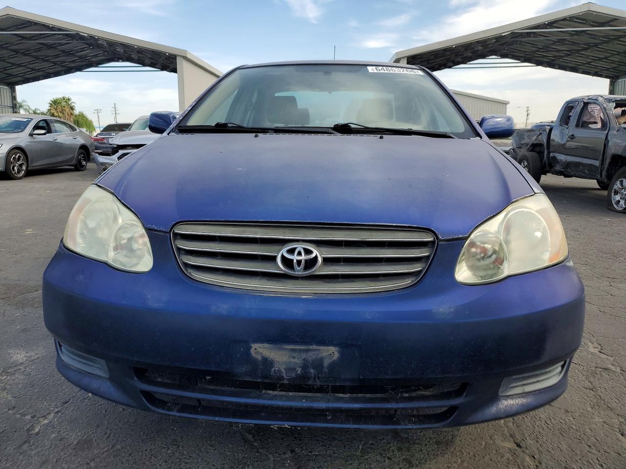 2003 Toyota Corolla Le Blue vin: JTDBR38E730041987