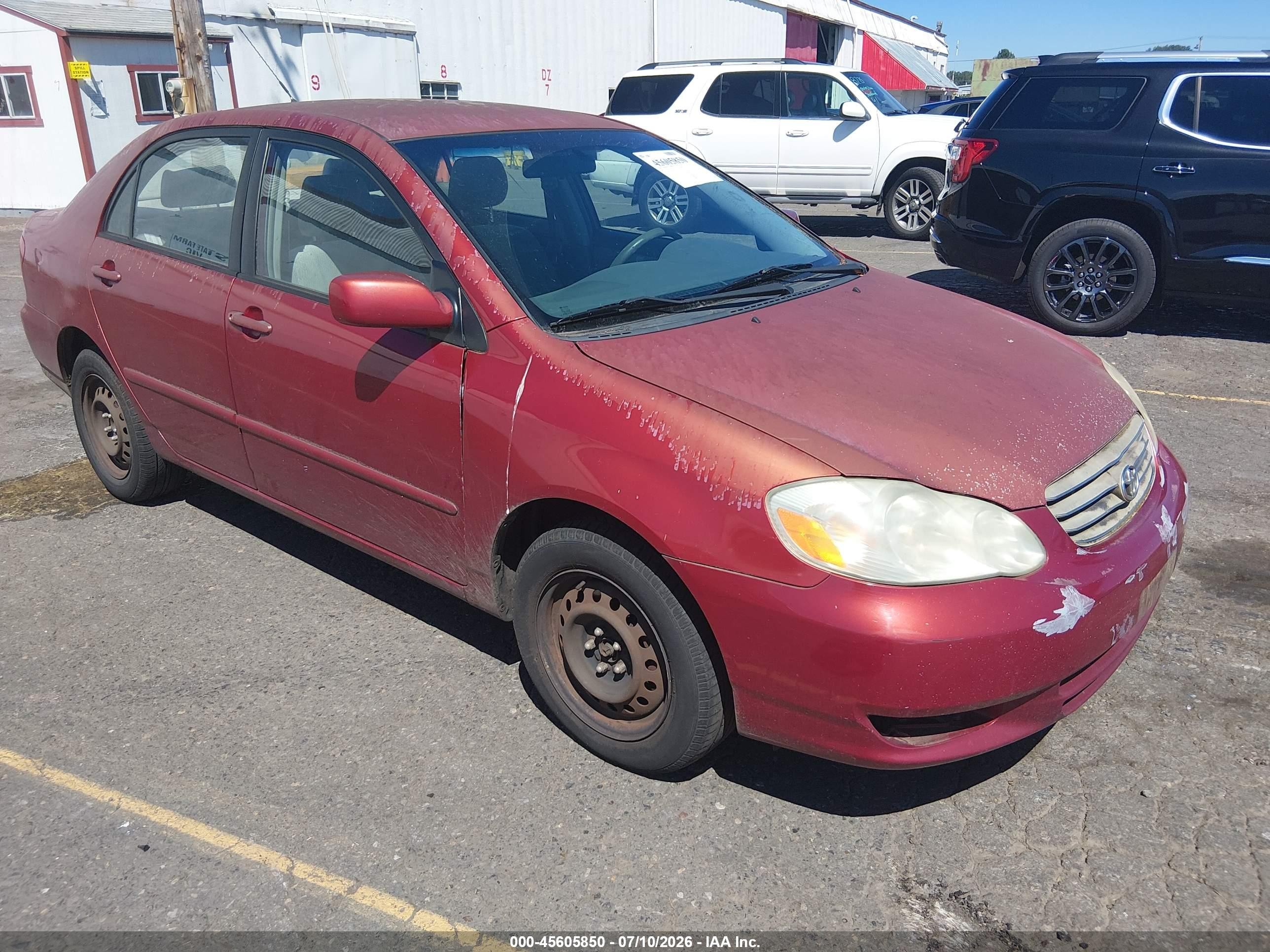 2003 Toyota Corolla Le Red vin: JTDBR38E732009870