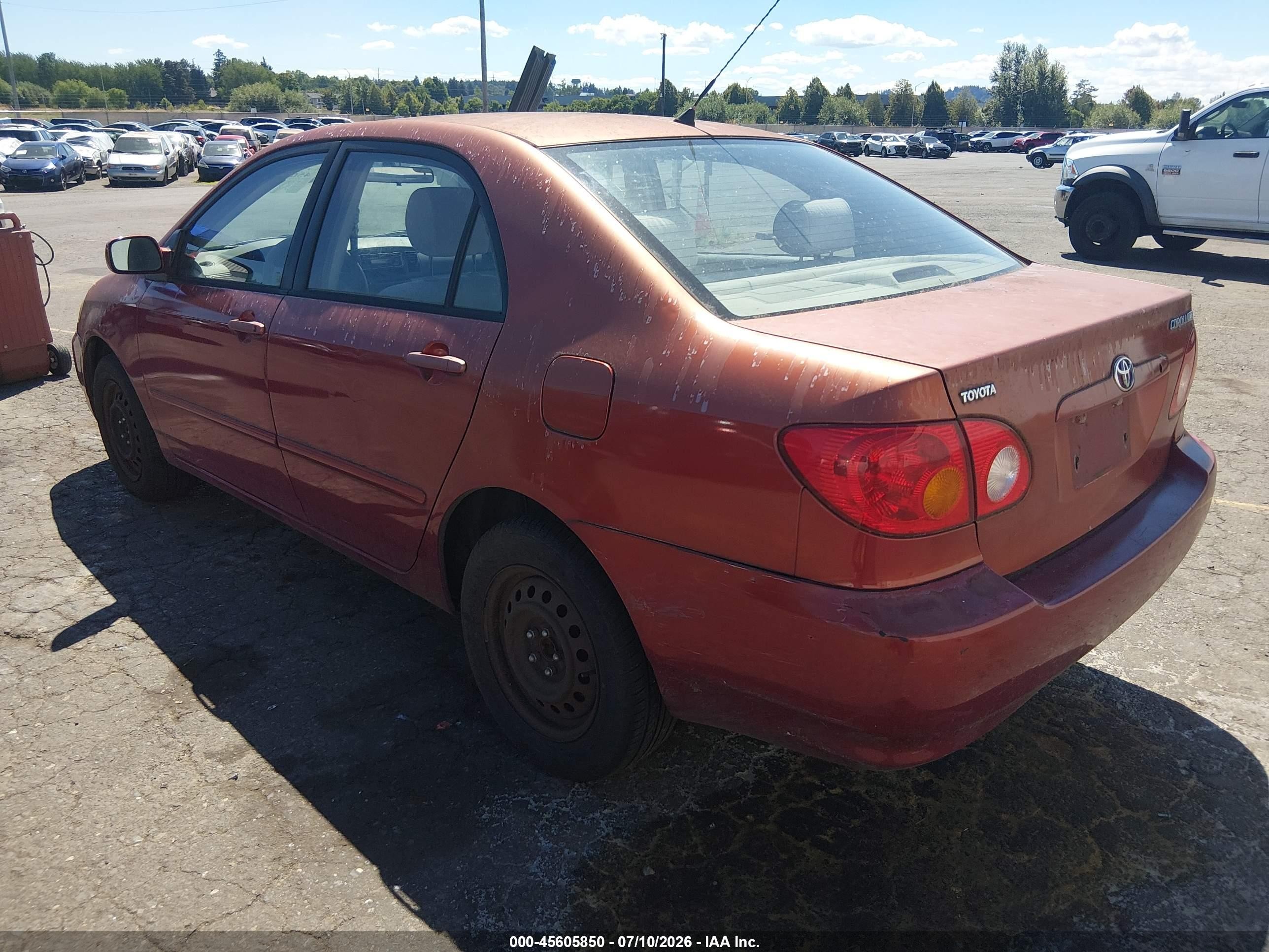 2003 Toyota Corolla Le Red vin: JTDBR38E732009870