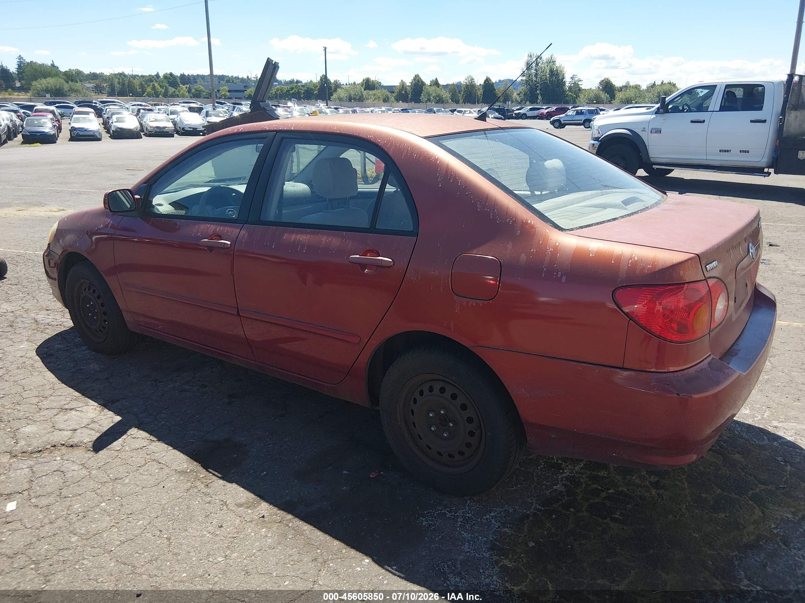 2003 Toyota Corolla Le Red vin: JTDBR38E732009870