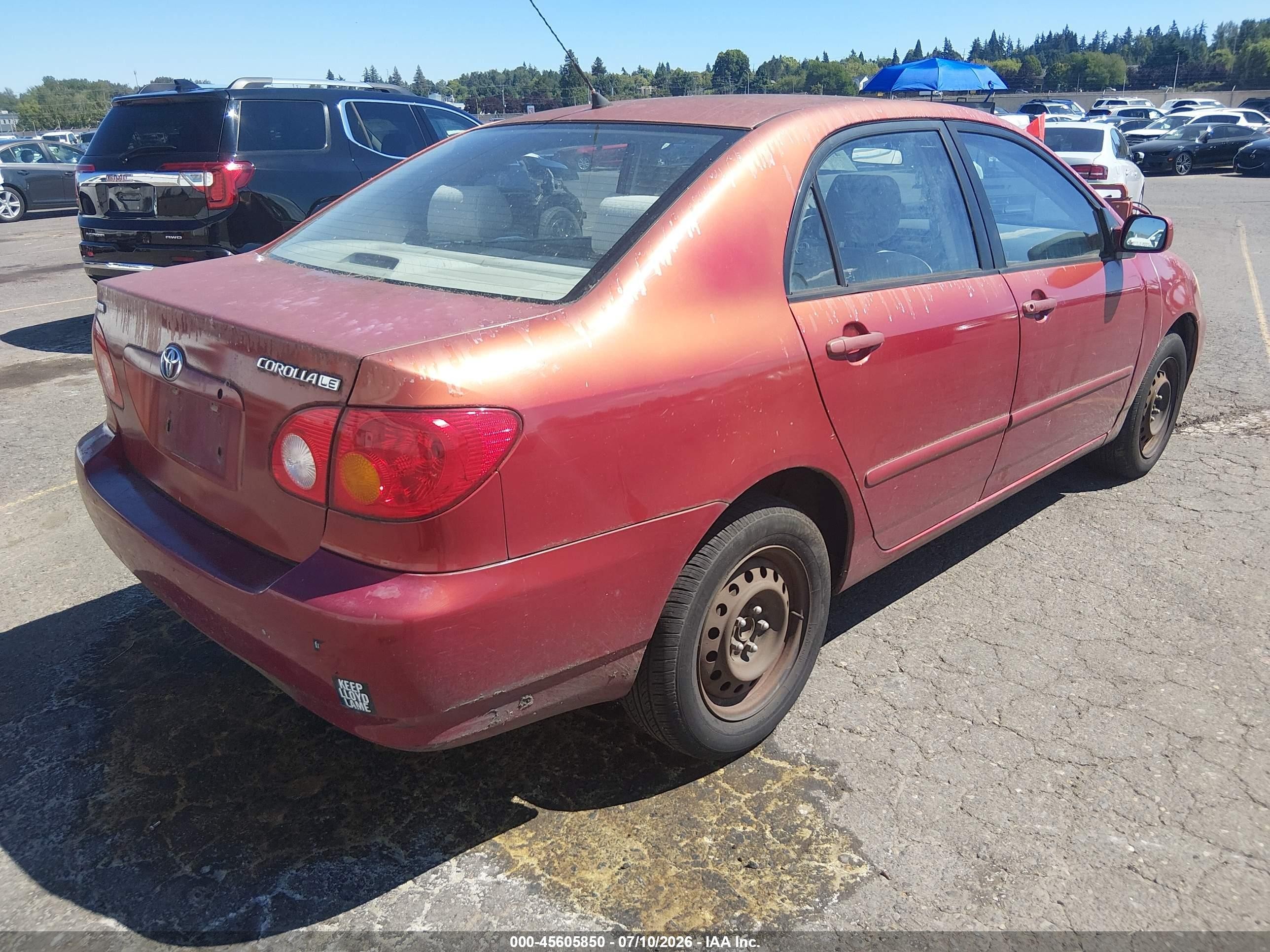 2003 Toyota Corolla Le Red vin: JTDBR38E732009870
