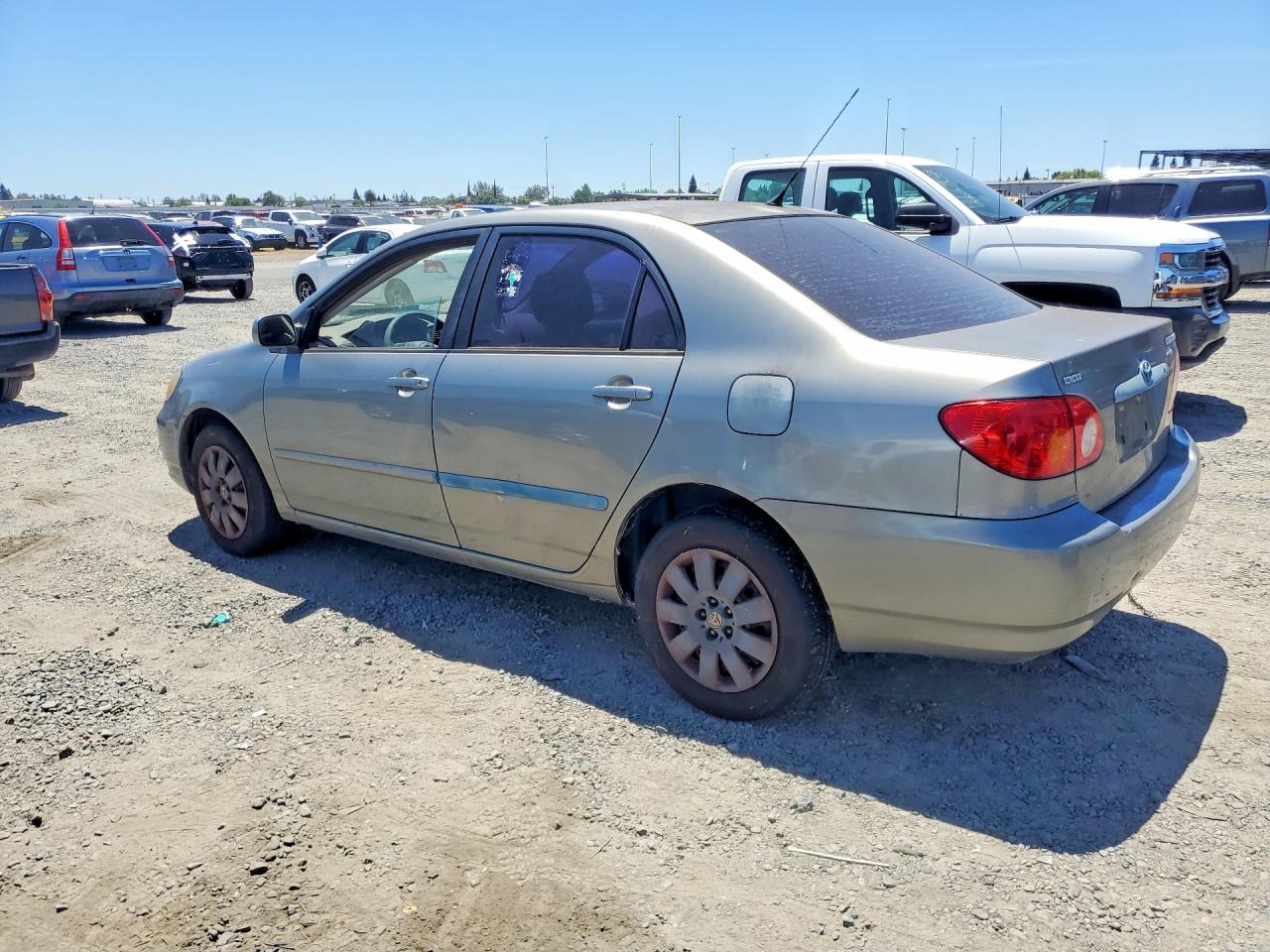 2004 Toyota Corolla Ce 4d Sedan Silver vin: JTDBR38E942026879