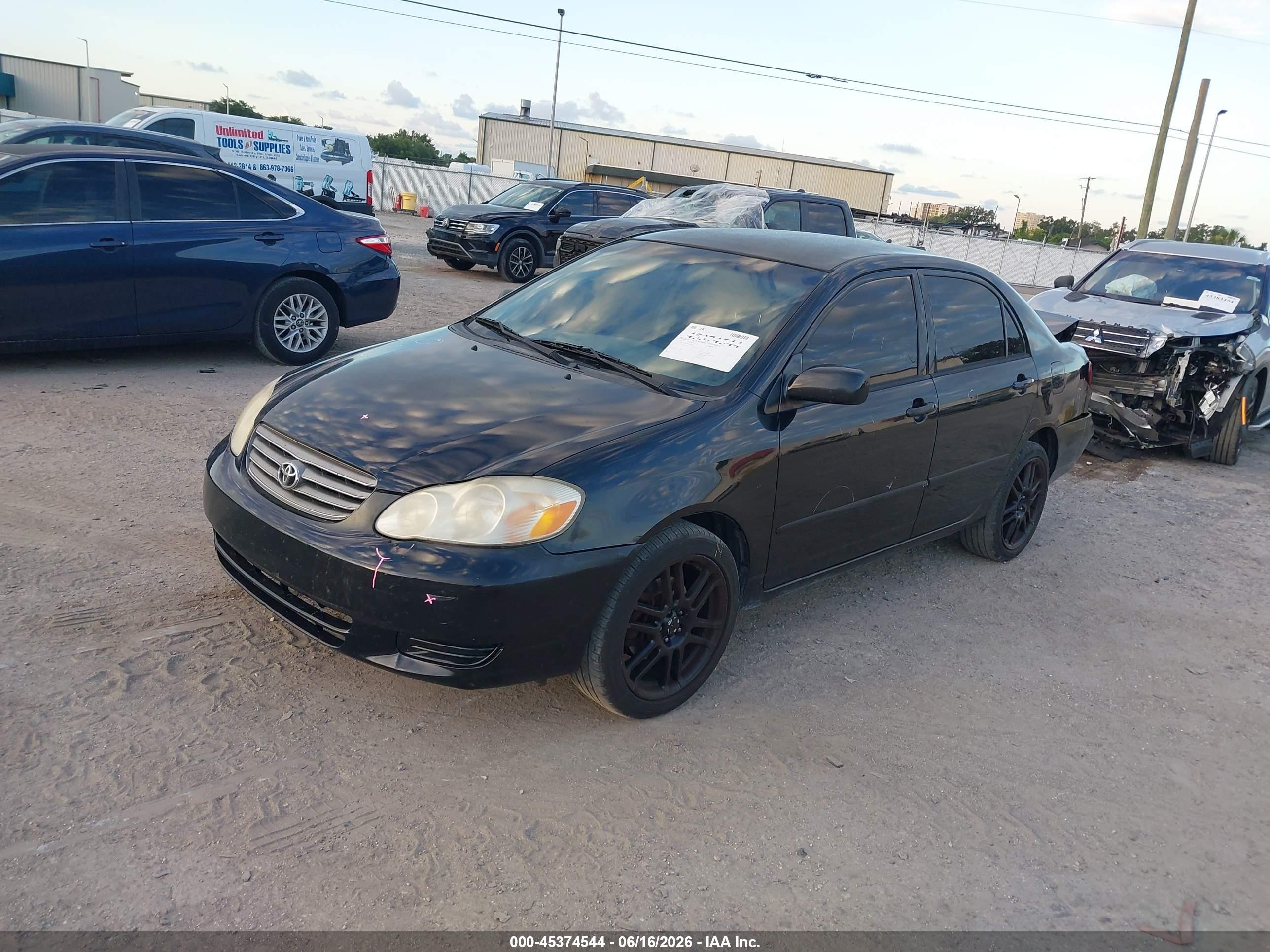 2004 Toyota Corolla Le Black vin: JTDBR38EX42028852