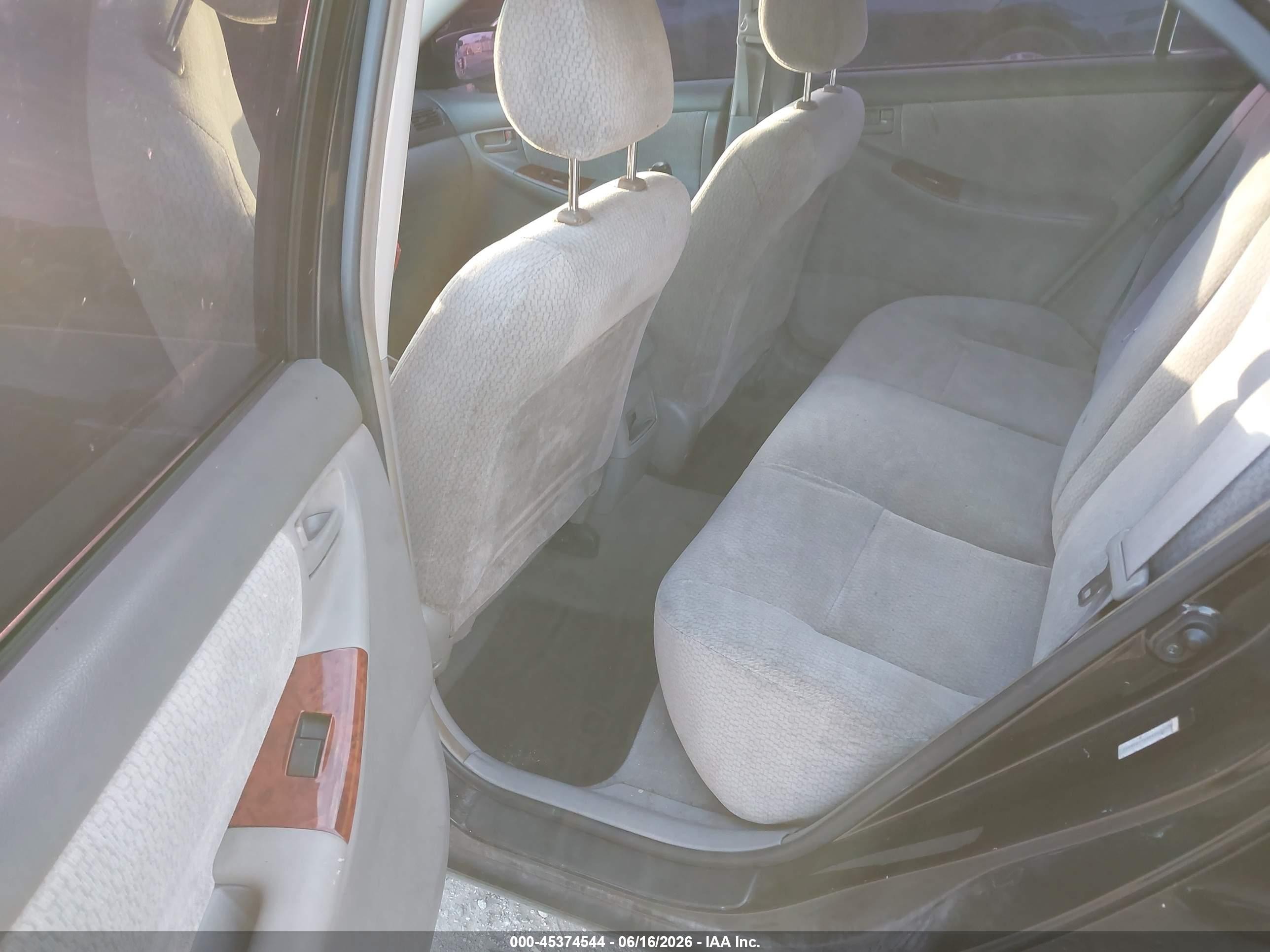 2004 Toyota Corolla Le Black vin: JTDBR38EX42028852