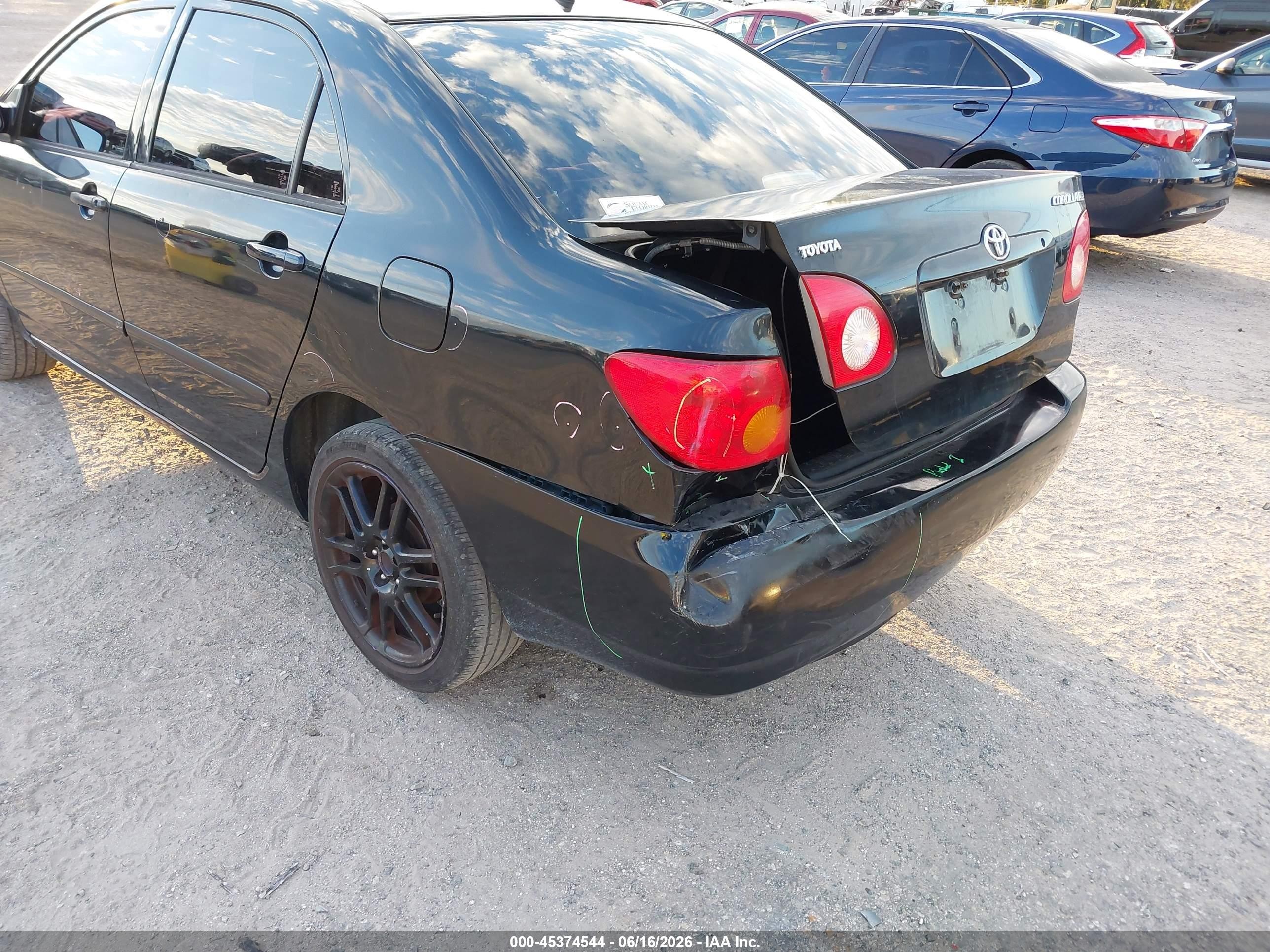 2004 Toyota Corolla Le Black vin: JTDBR38EX42028852