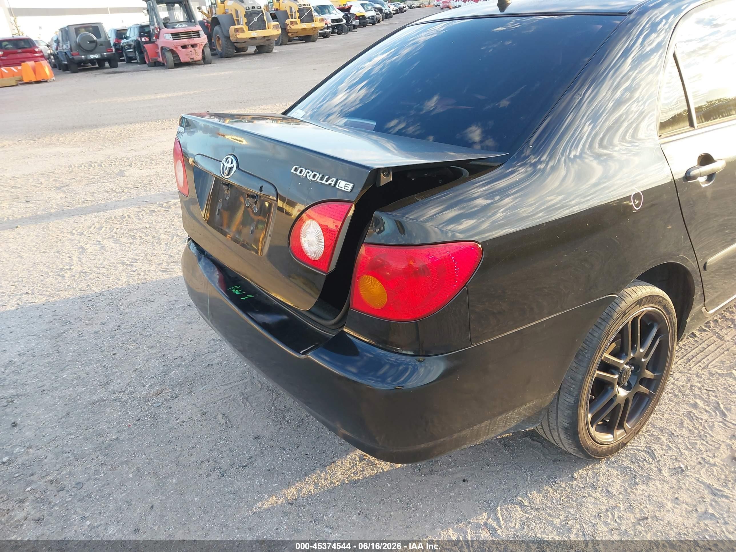 2004 Toyota Corolla Le Black vin: JTDBR38EX42028852