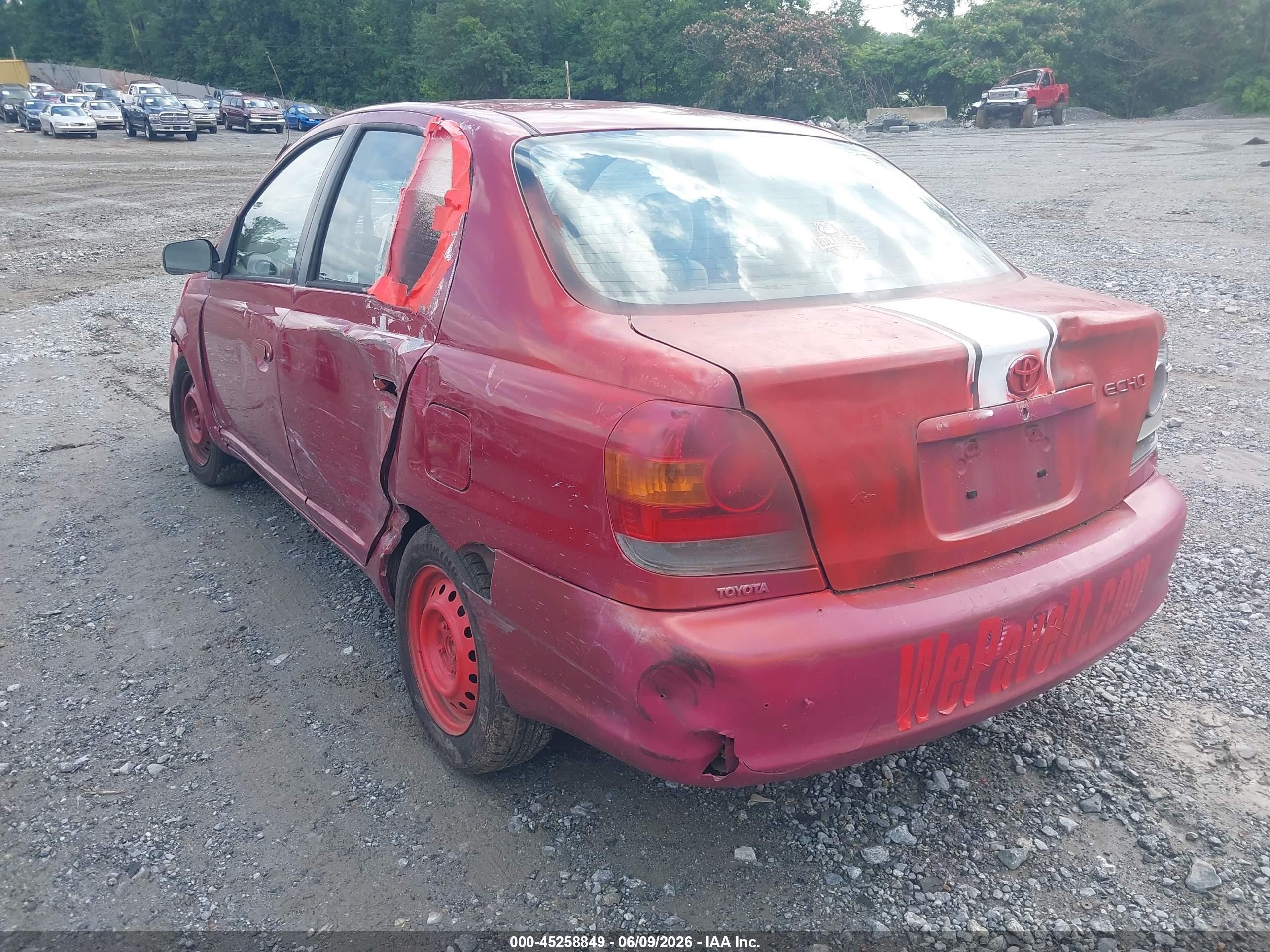 2003 Toyota Echo   Red vin: JTDBT123035045783