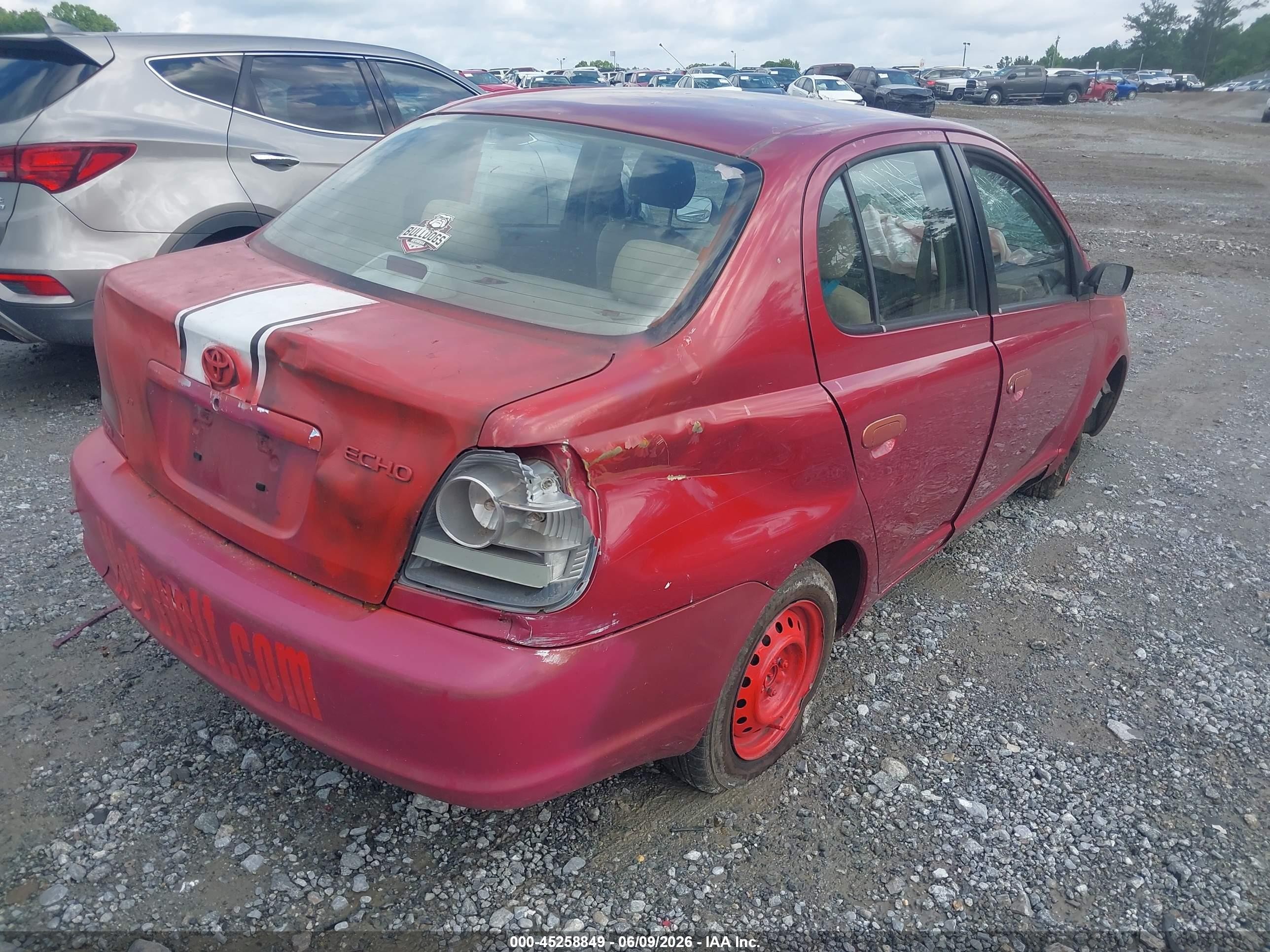 2003 Toyota Echo   Red vin: JTDBT123035045783