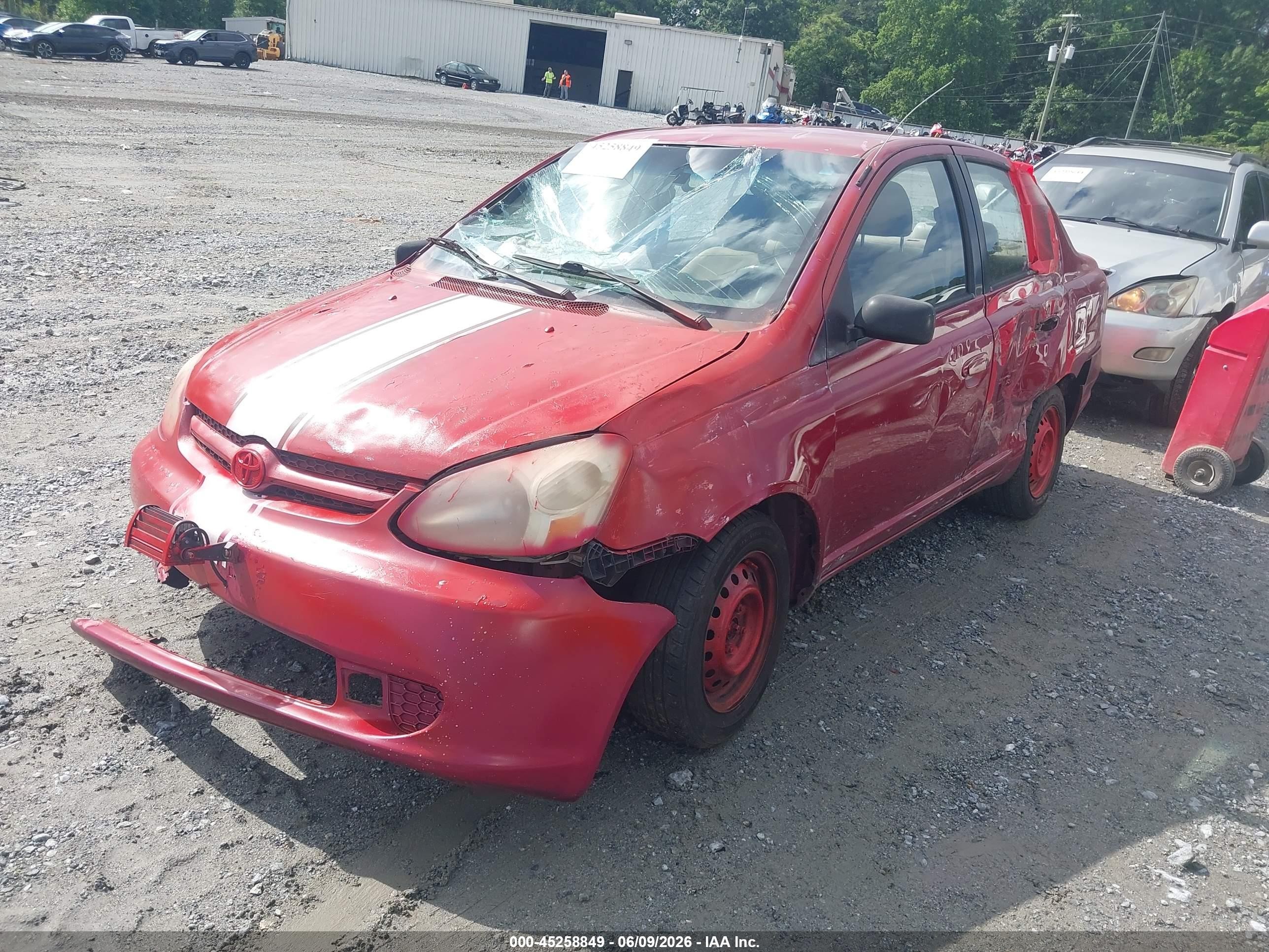 2003 Toyota Echo   Red vin: JTDBT123035045783