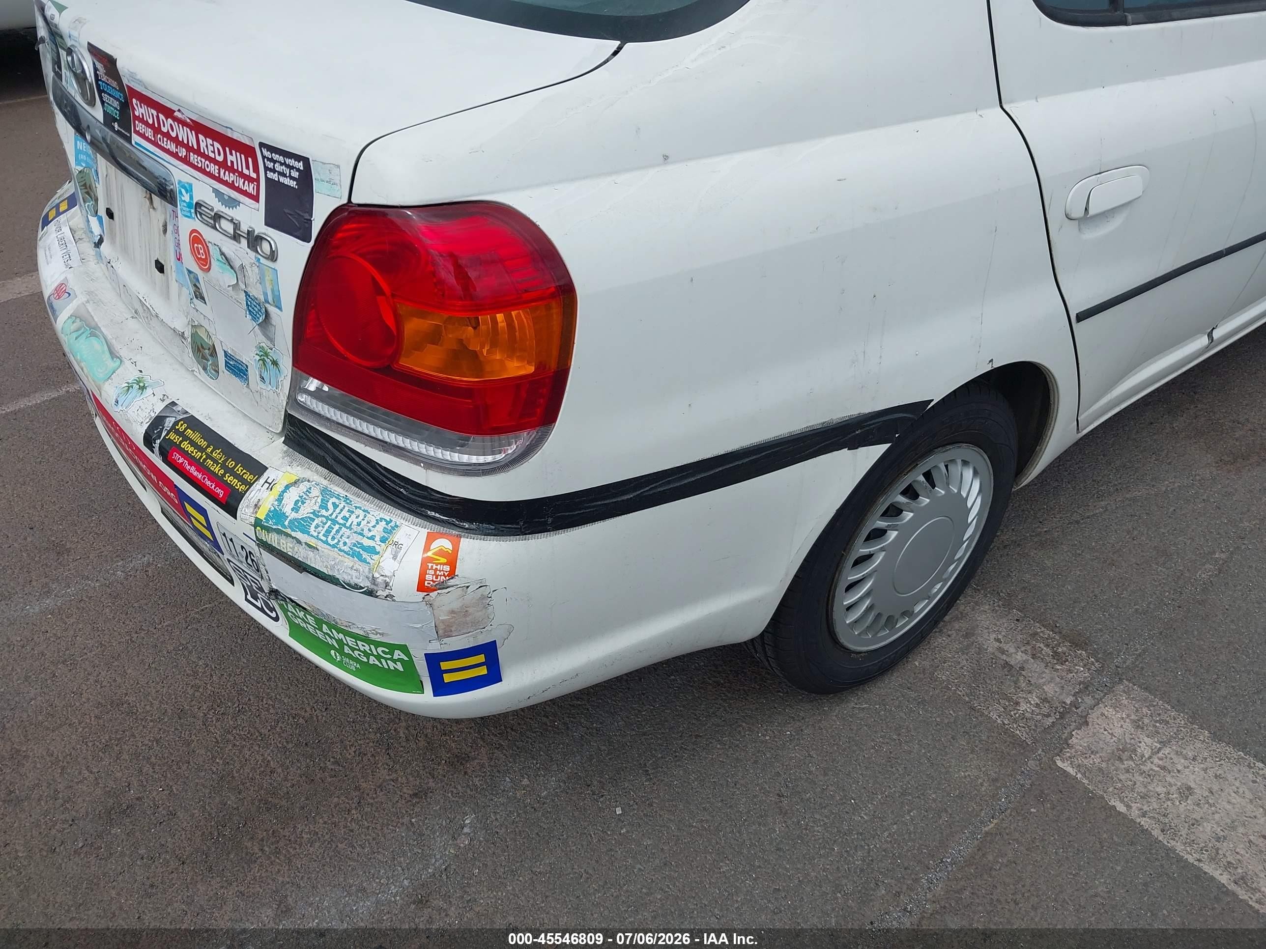 2003 Toyota Echo   White vin: JTDBT123130271487
