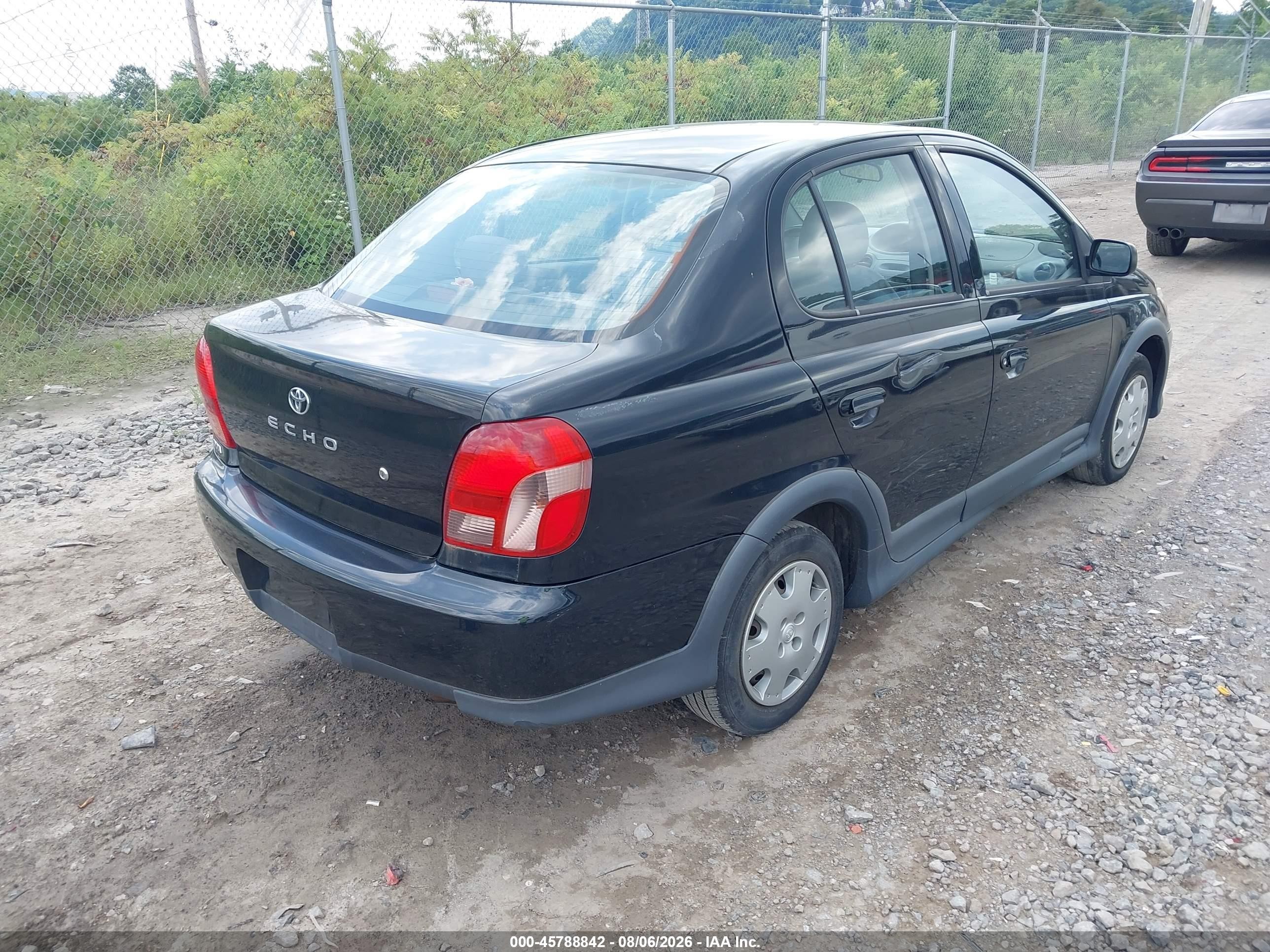 2000 Toyota Echo   Black vin: JTDBT1231Y0010609