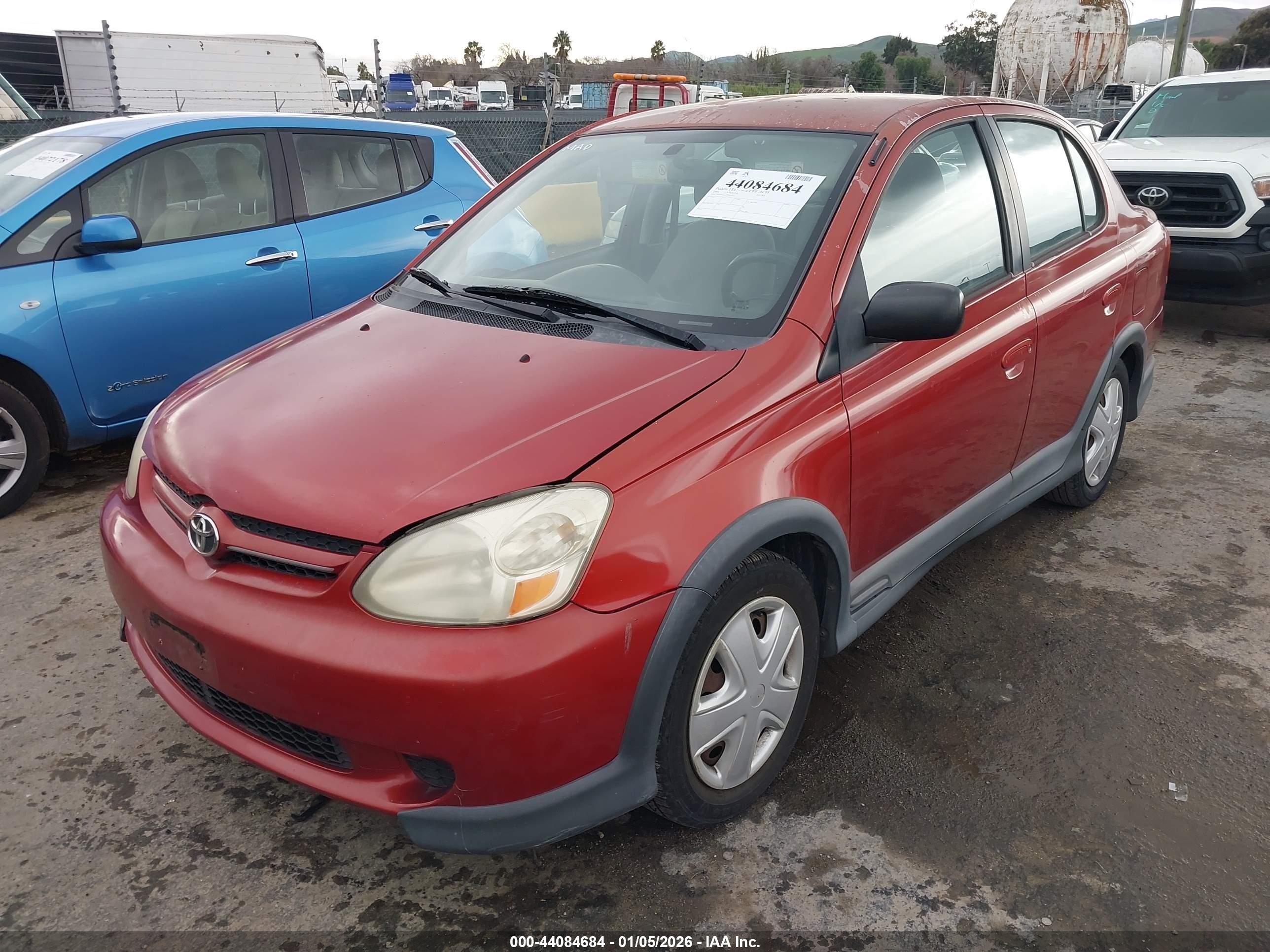2004 Toyota Echo   Оранжевый vin: JTDBT123240324912