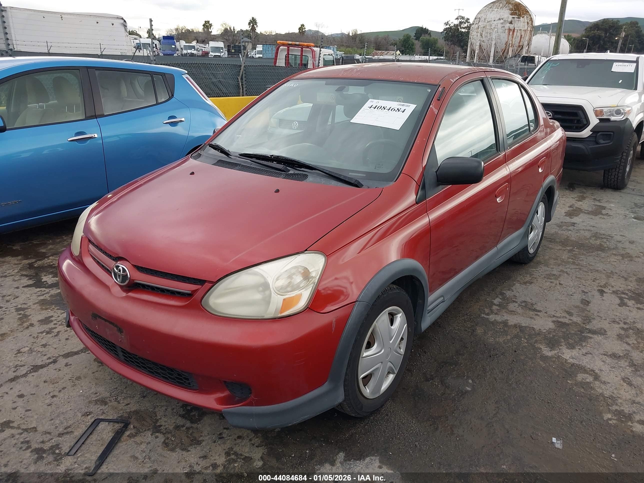 2004 Toyota Echo   Оранжевый vin: JTDBT123240324912