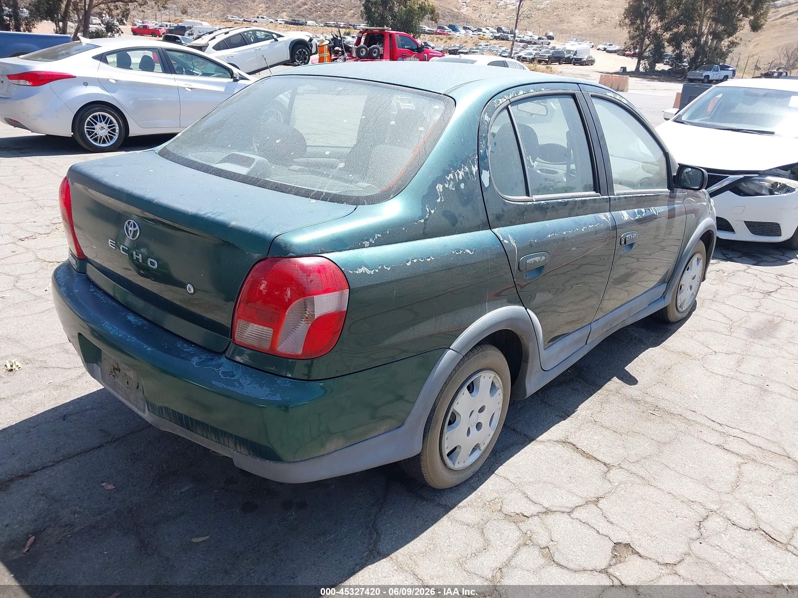 2000 Toyota Echo   Green vin: JTDBT1232Y0071757