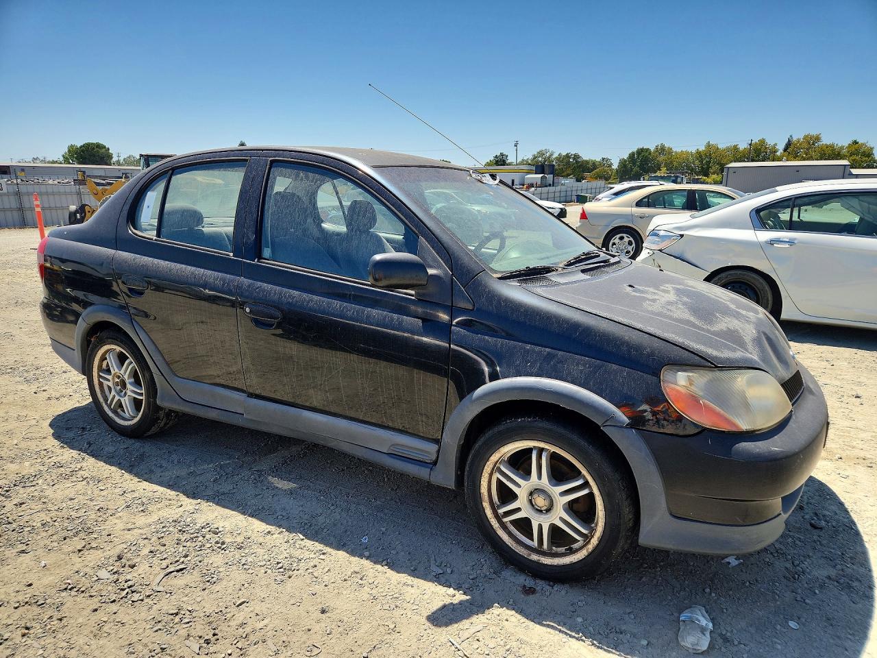 2002 Toyota Echo Base Black vin: JTDBT123320216571