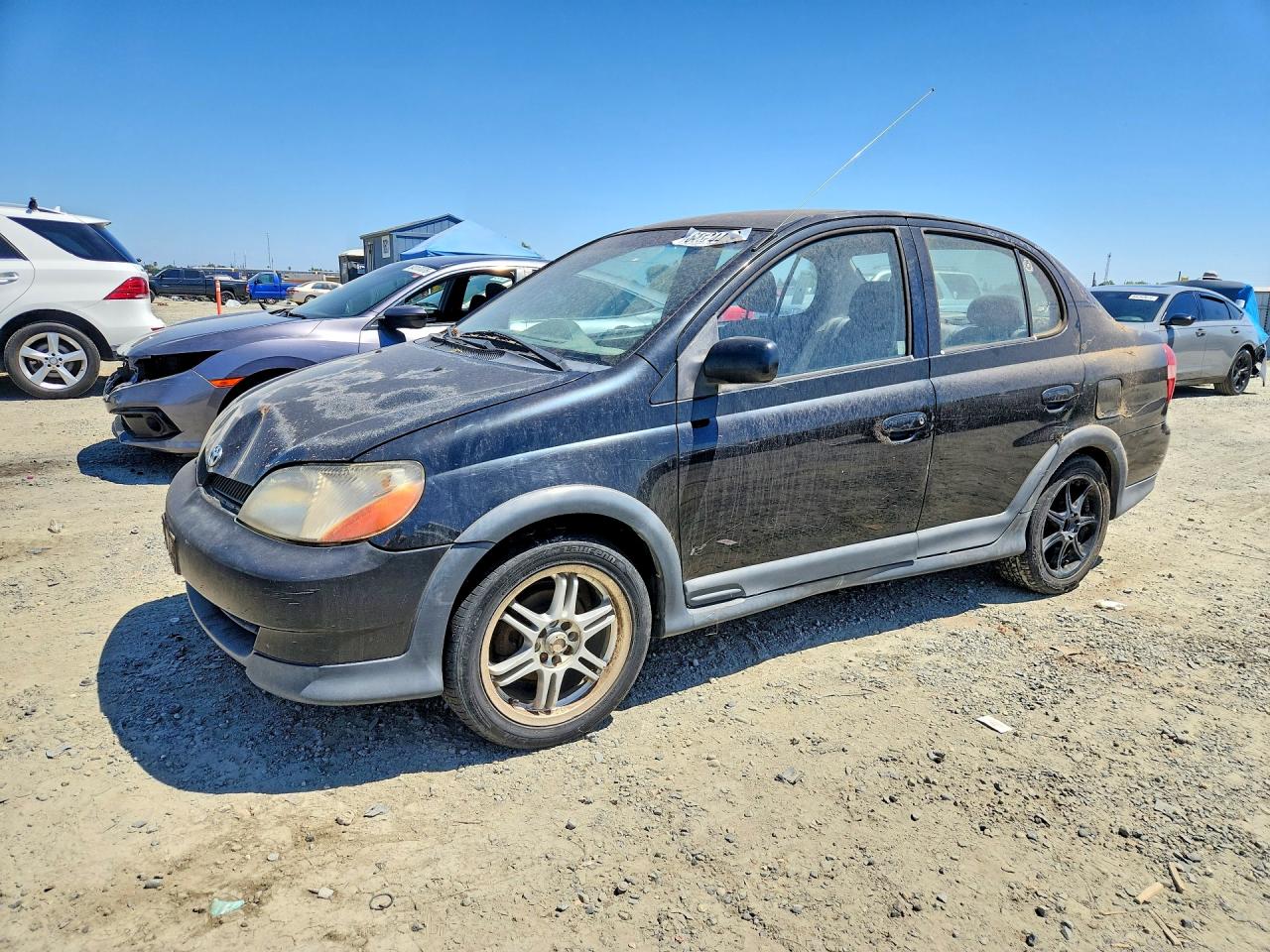 2002 Toyota Echo Base Black vin: JTDBT123320216571