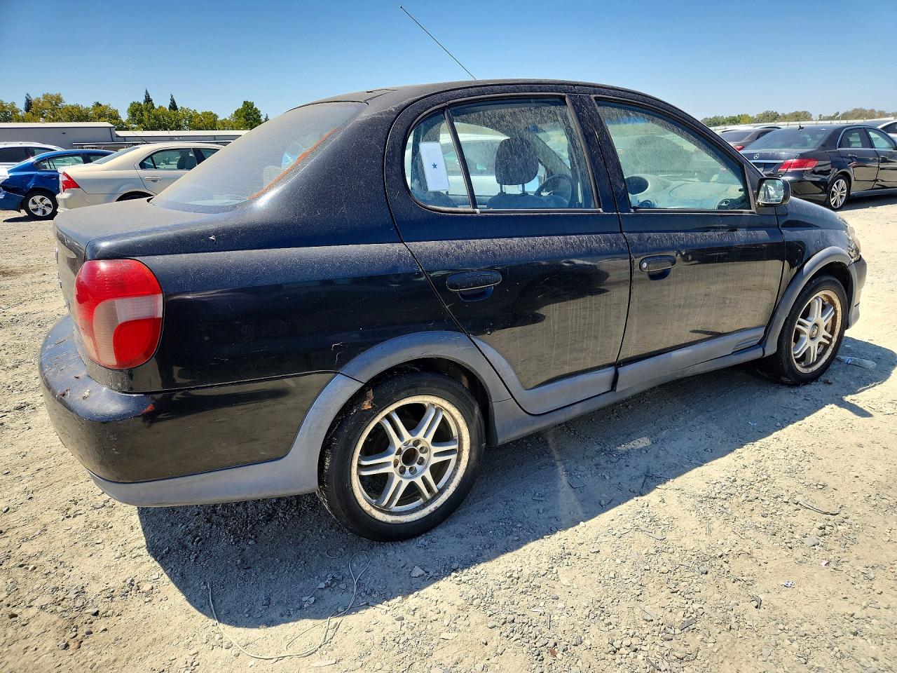 2002 Toyota Echo Base Black vin: JTDBT123320216571