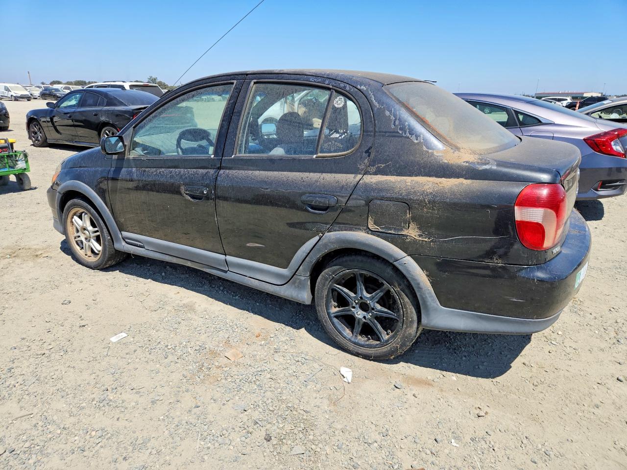 2002 Toyota Echo Base Black vin: JTDBT123320216571