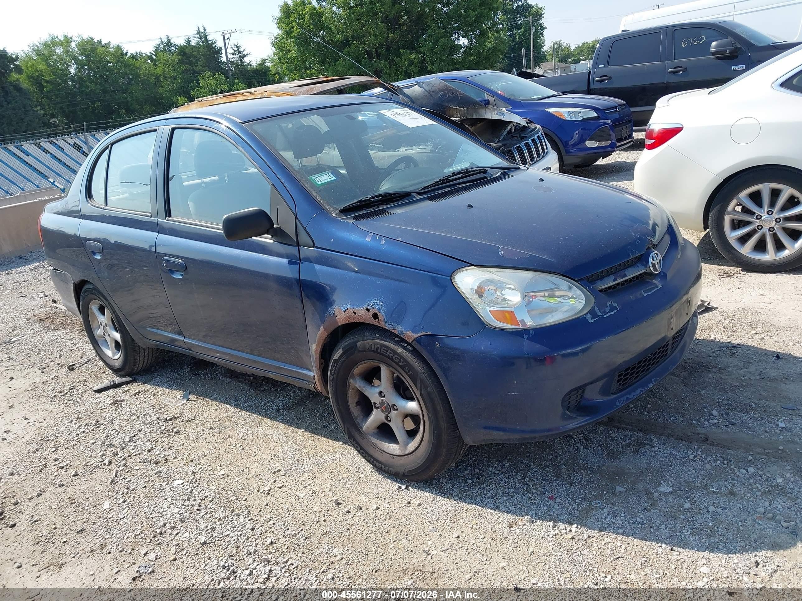 2003 Toyota Echo   Синий vin: JTDBT123335052629