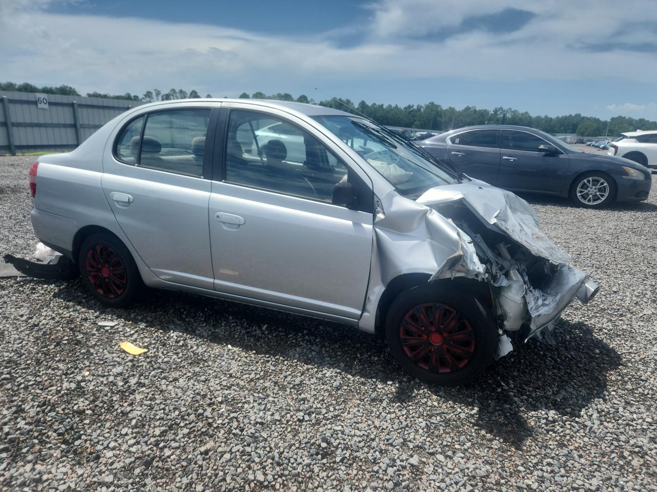 2002 Toyota Echo Base Серебряный vin: JTDBT123420217003