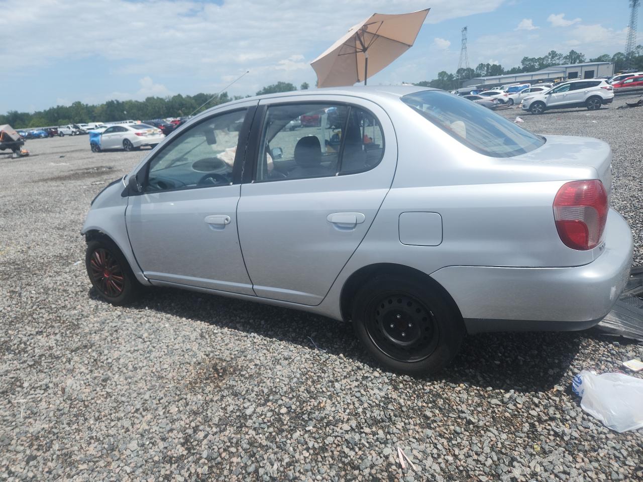2002 Toyota Echo Base Серебряный vin: JTDBT123420217003