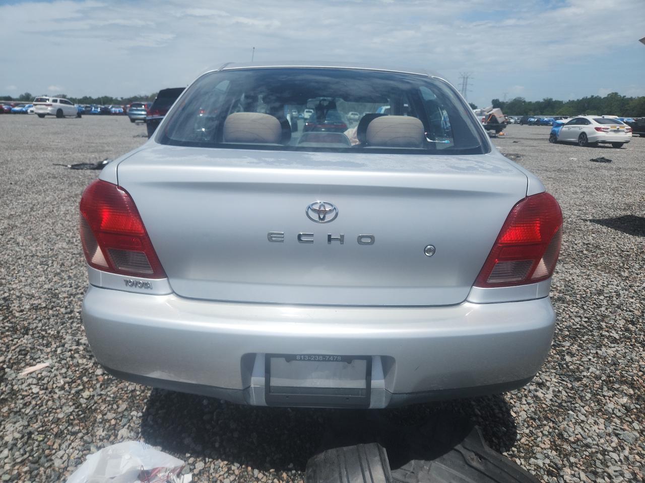 2002 Toyota Echo Base Серебряный vin: JTDBT123420217003