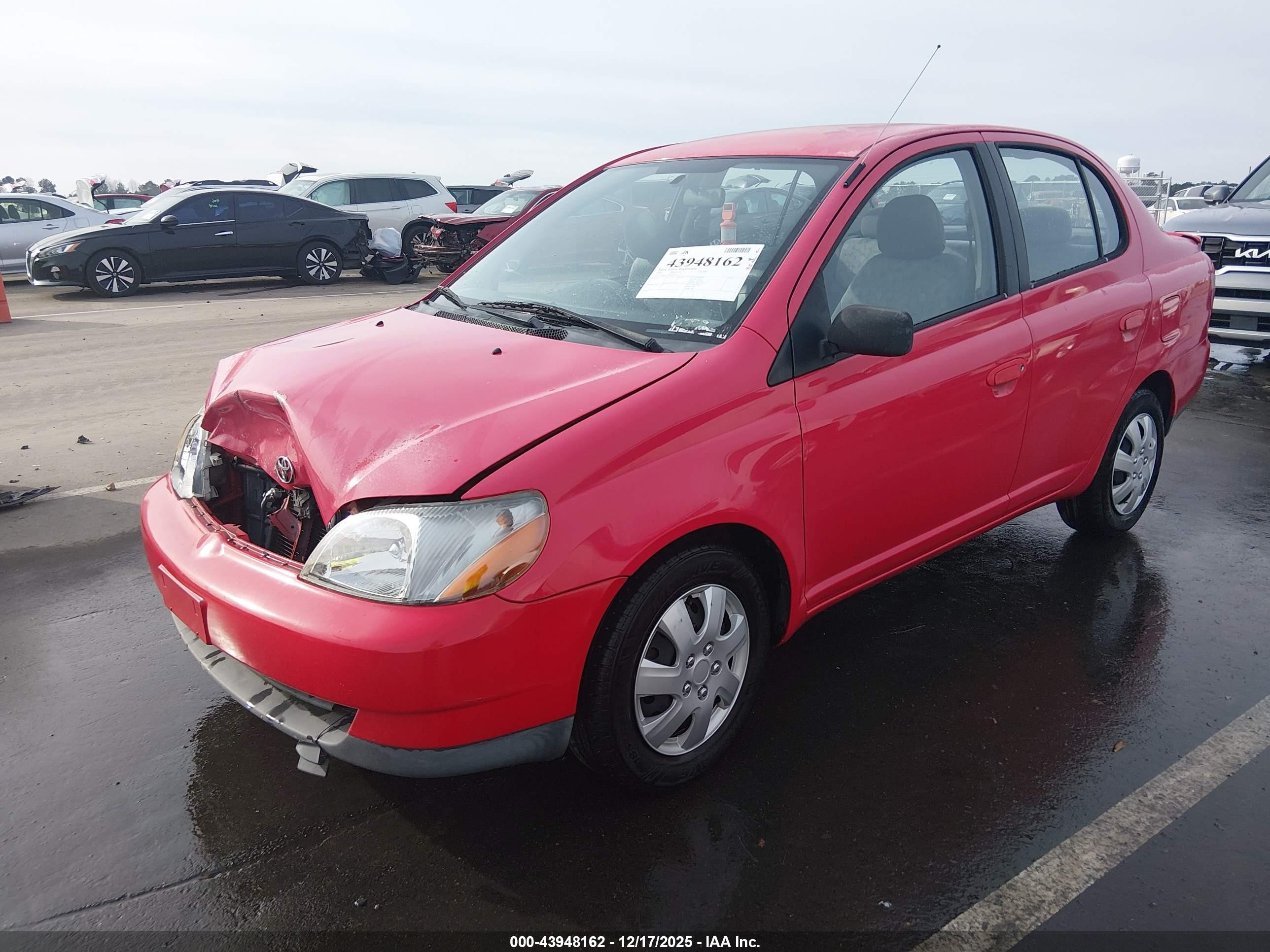 2002 Toyota Echo   Red vin: JTDBT123420254231