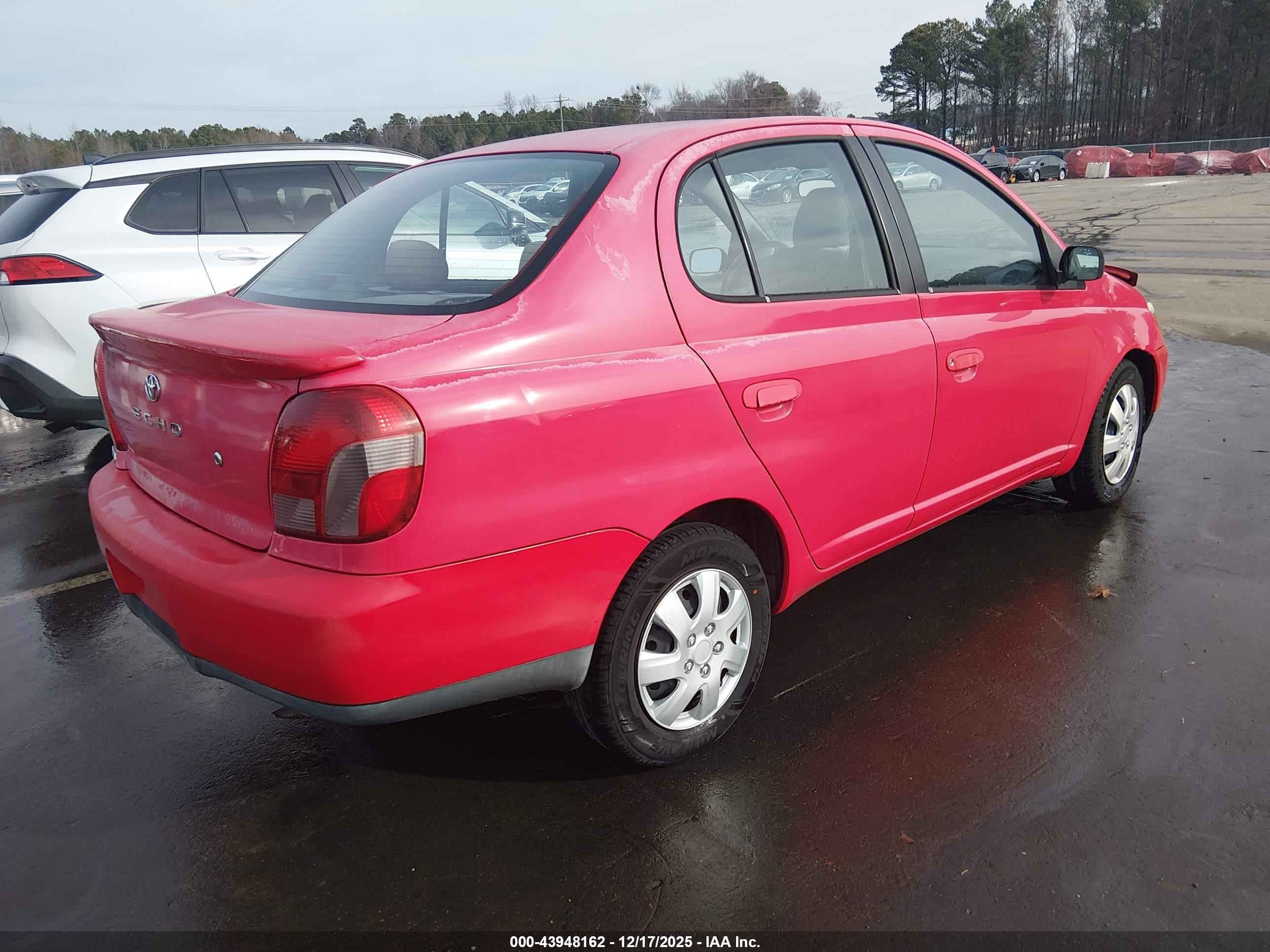 2002 Toyota Echo   Red vin: JTDBT123420254231