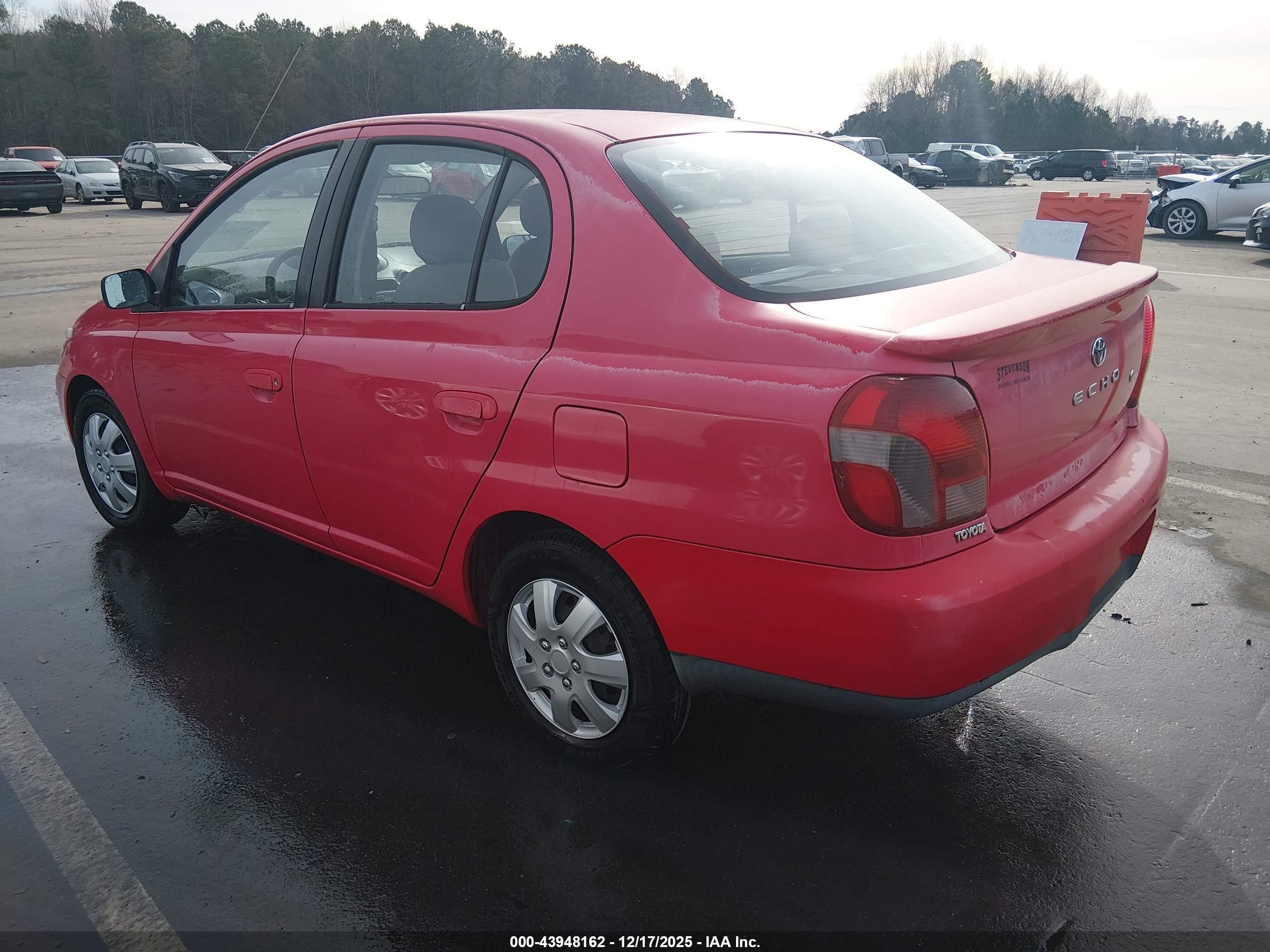 2002 Toyota Echo   Red vin: JTDBT123420254231