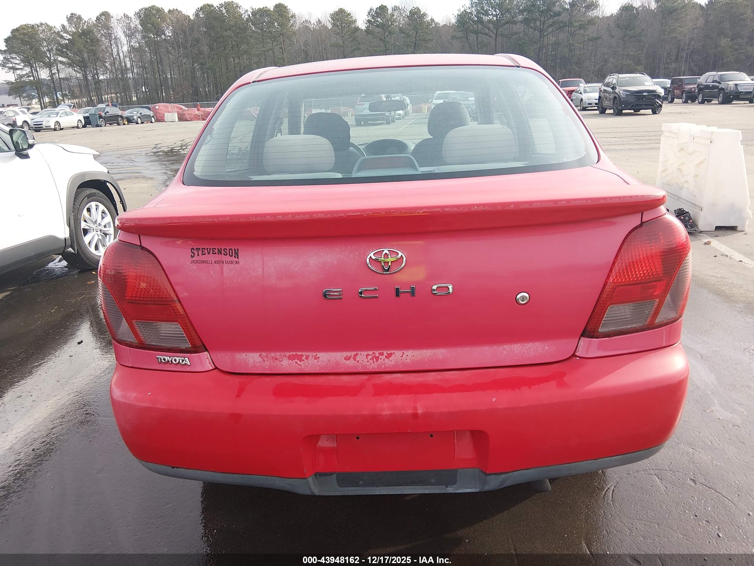 2002 Toyota Echo   Red vin: JTDBT123420254231