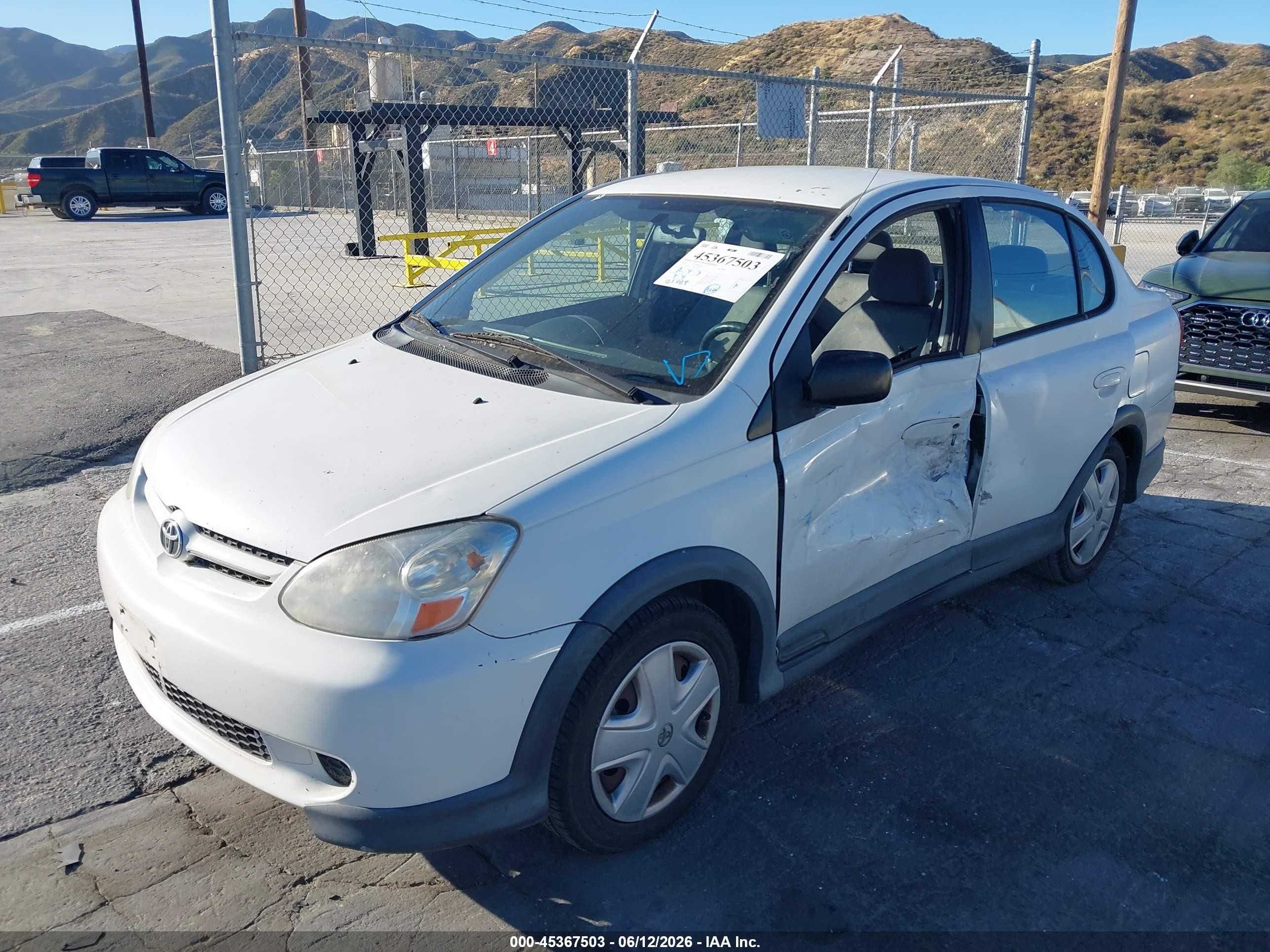 2003 Toyota Echo   White vin: JTDBT123530292228