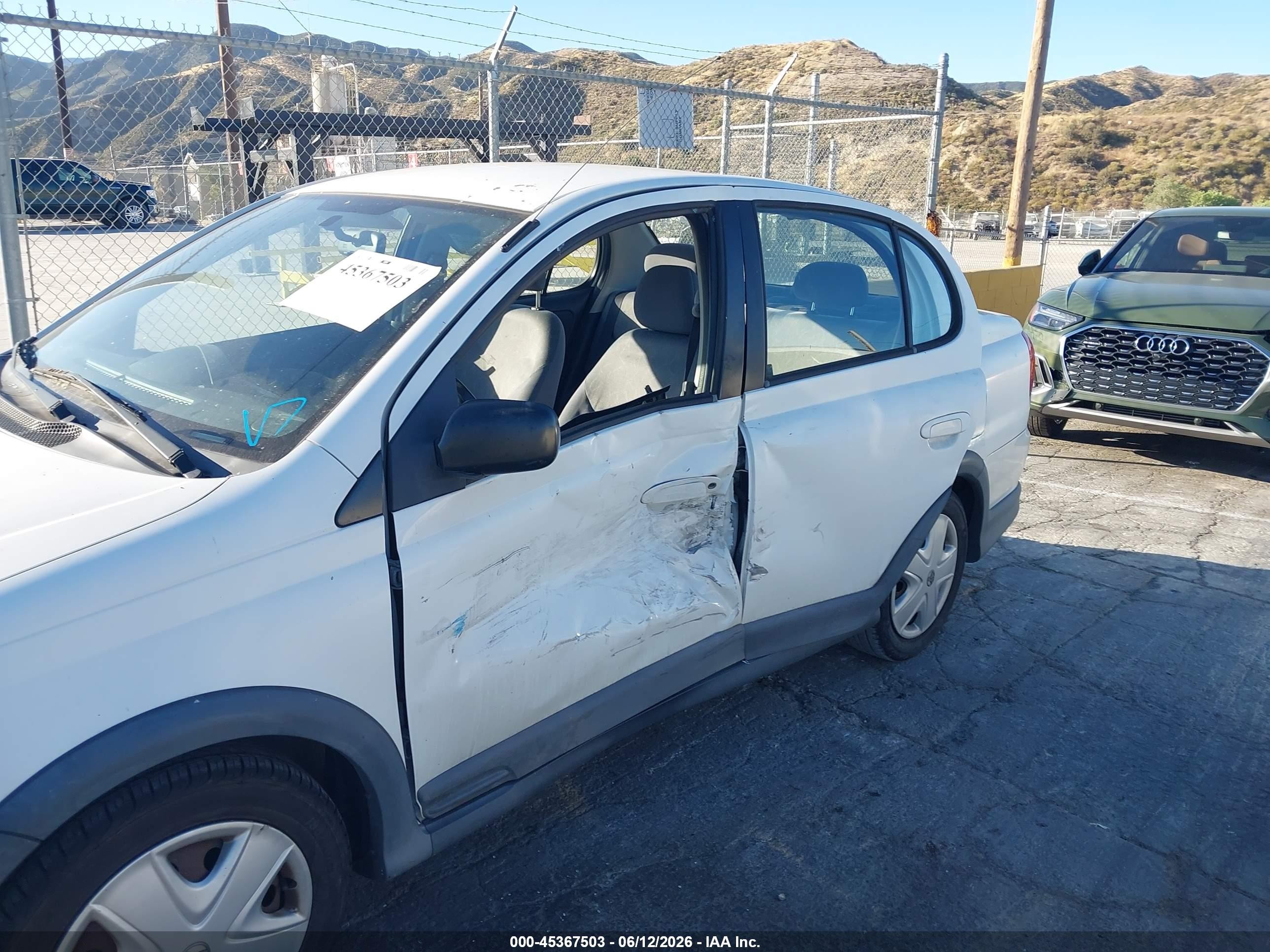 2003 Toyota Echo   White vin: JTDBT123530292228