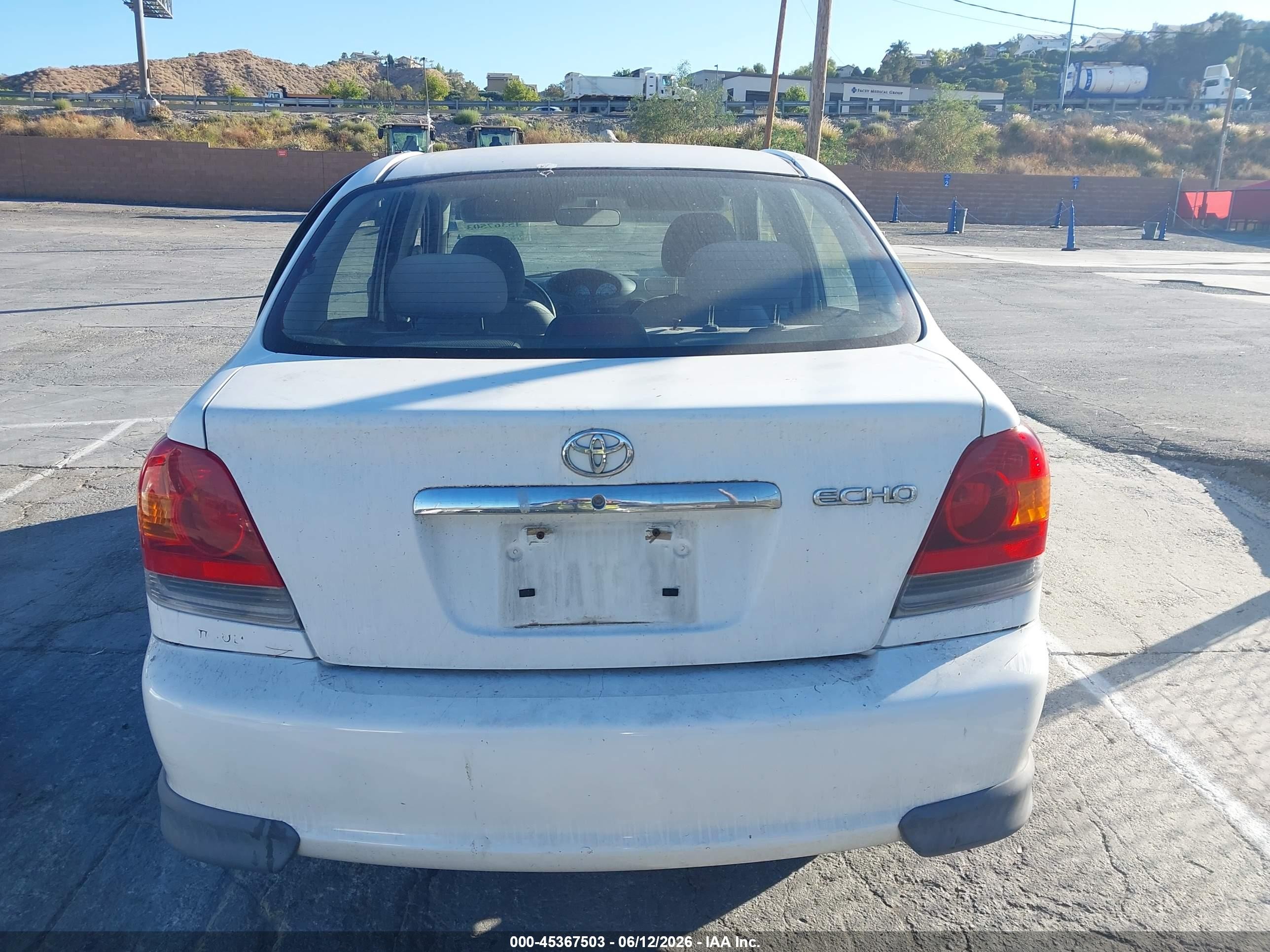 2003 Toyota Echo   White vin: JTDBT123530292228