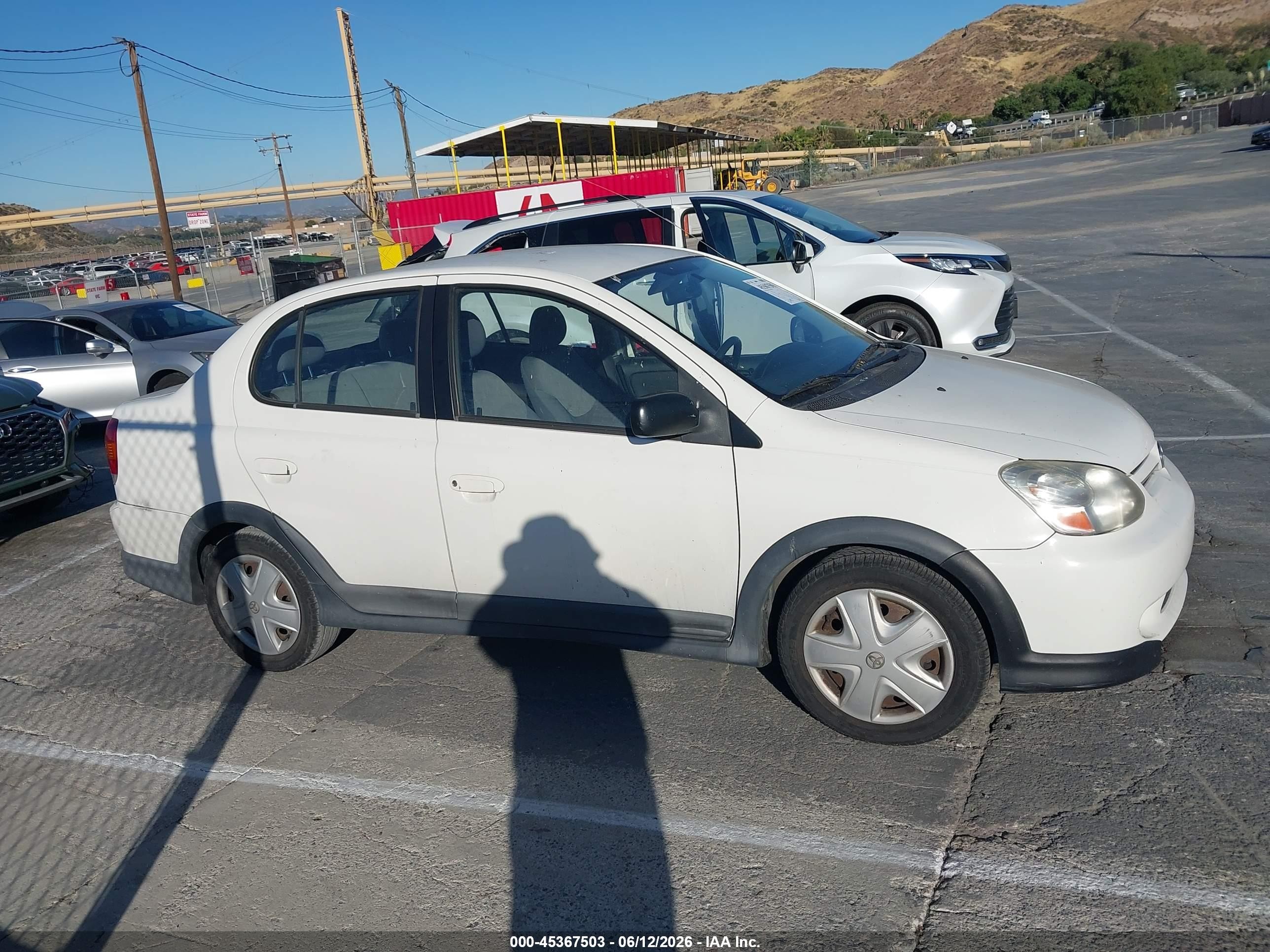 2003 Toyota Echo   White vin: JTDBT123530292228