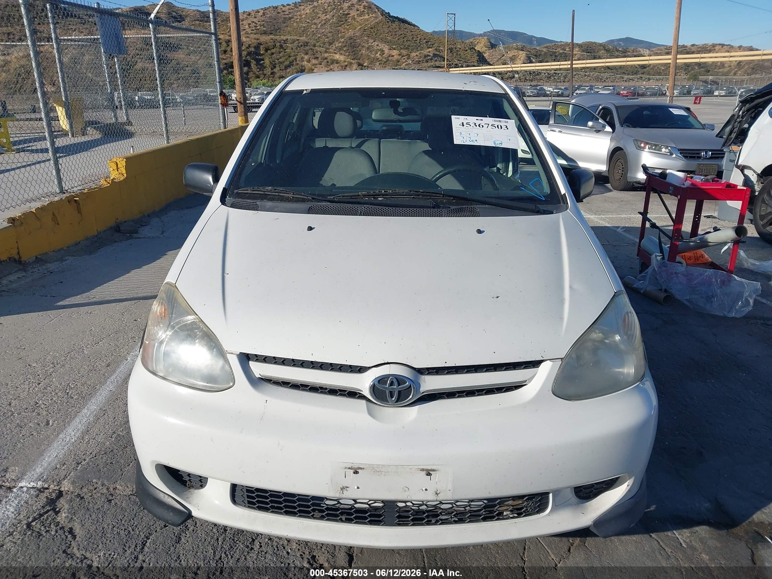2003 Toyota Echo   White vin: JTDBT123530292228