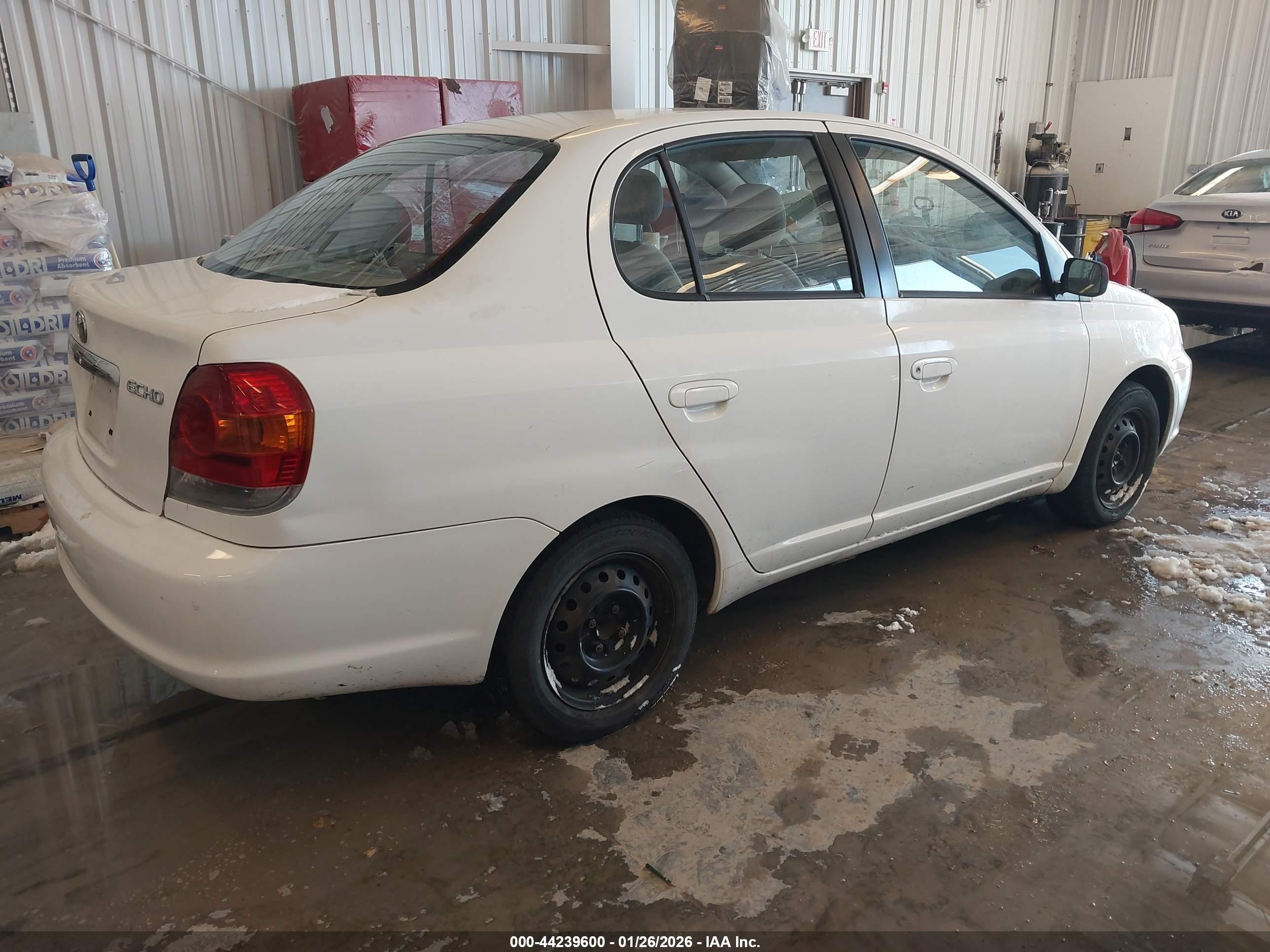 2004 Toyota Echo   White vin: JTDBT123540322605