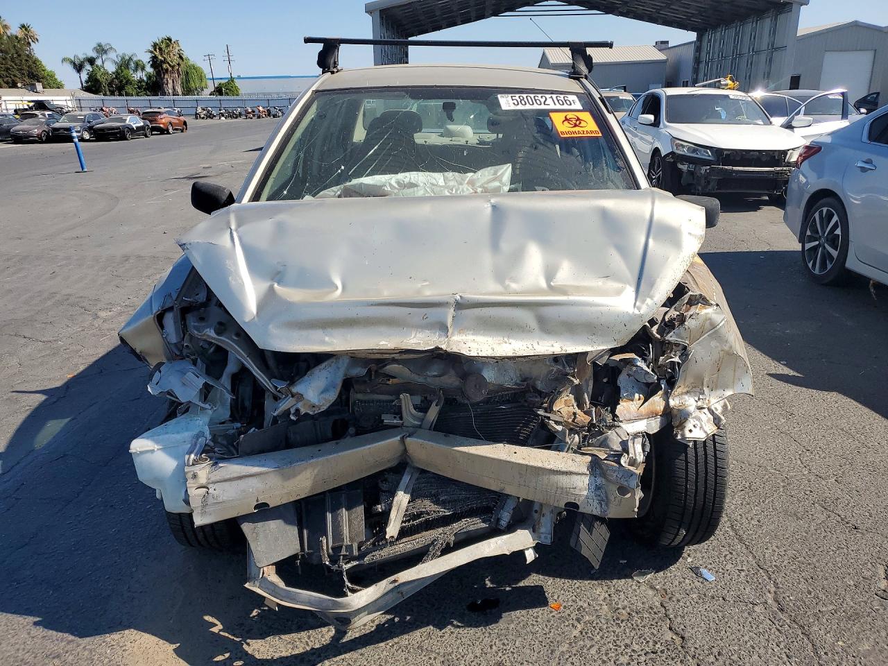 2003 Toyota Echo Base Tan vin: JTDBT123630259965