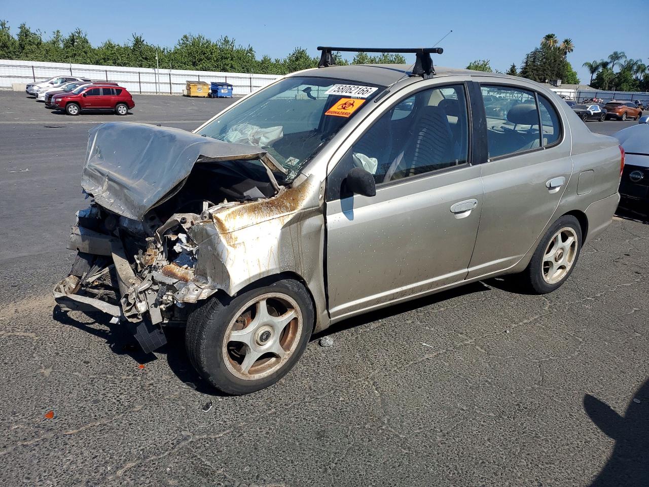 2003 Toyota Echo Base Tan vin: JTDBT123630259965